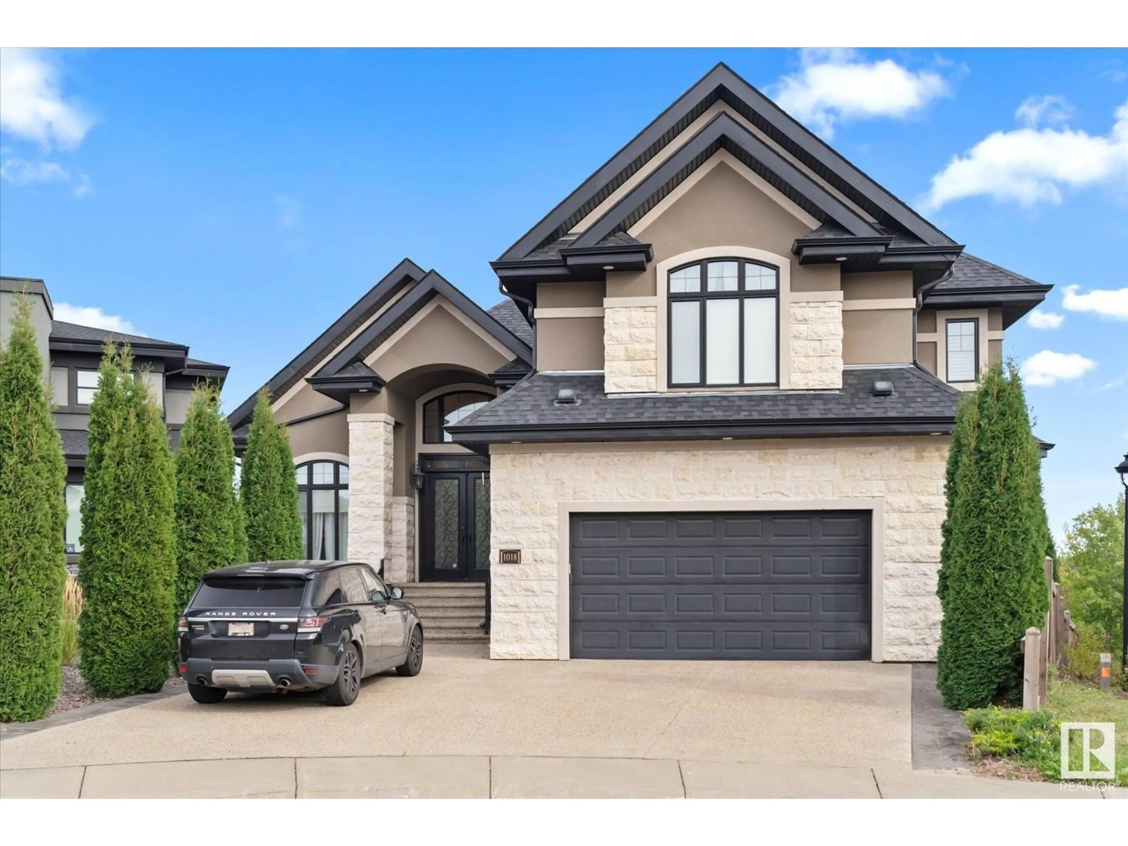 Home with brick exterior material, street for NW - 1018 HOLLANDS PT, Edmonton Alberta T6R3T1