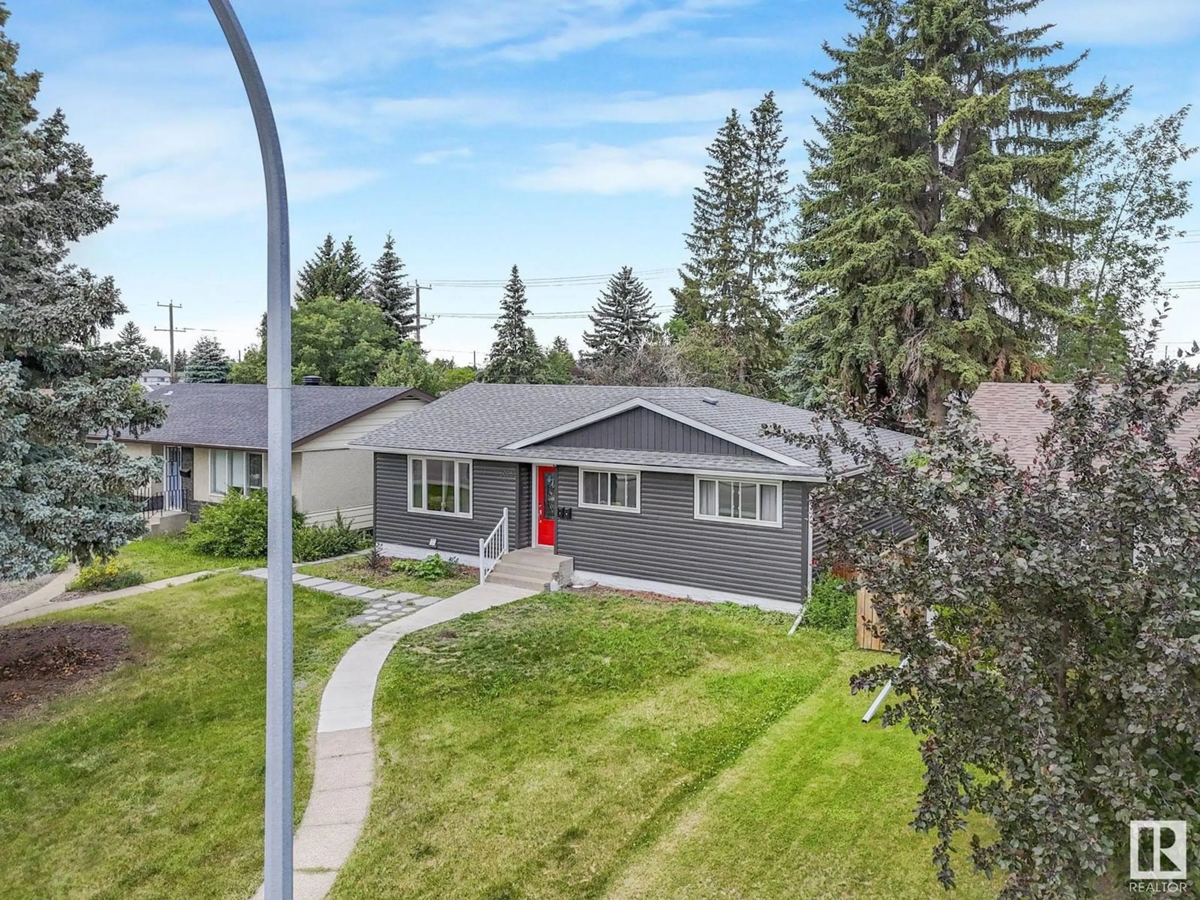 A pic from outside/outdoor area/front of a property/back of a property/a pic from drone, street for 6008 101A AV, Edmonton Alberta T6A0M1