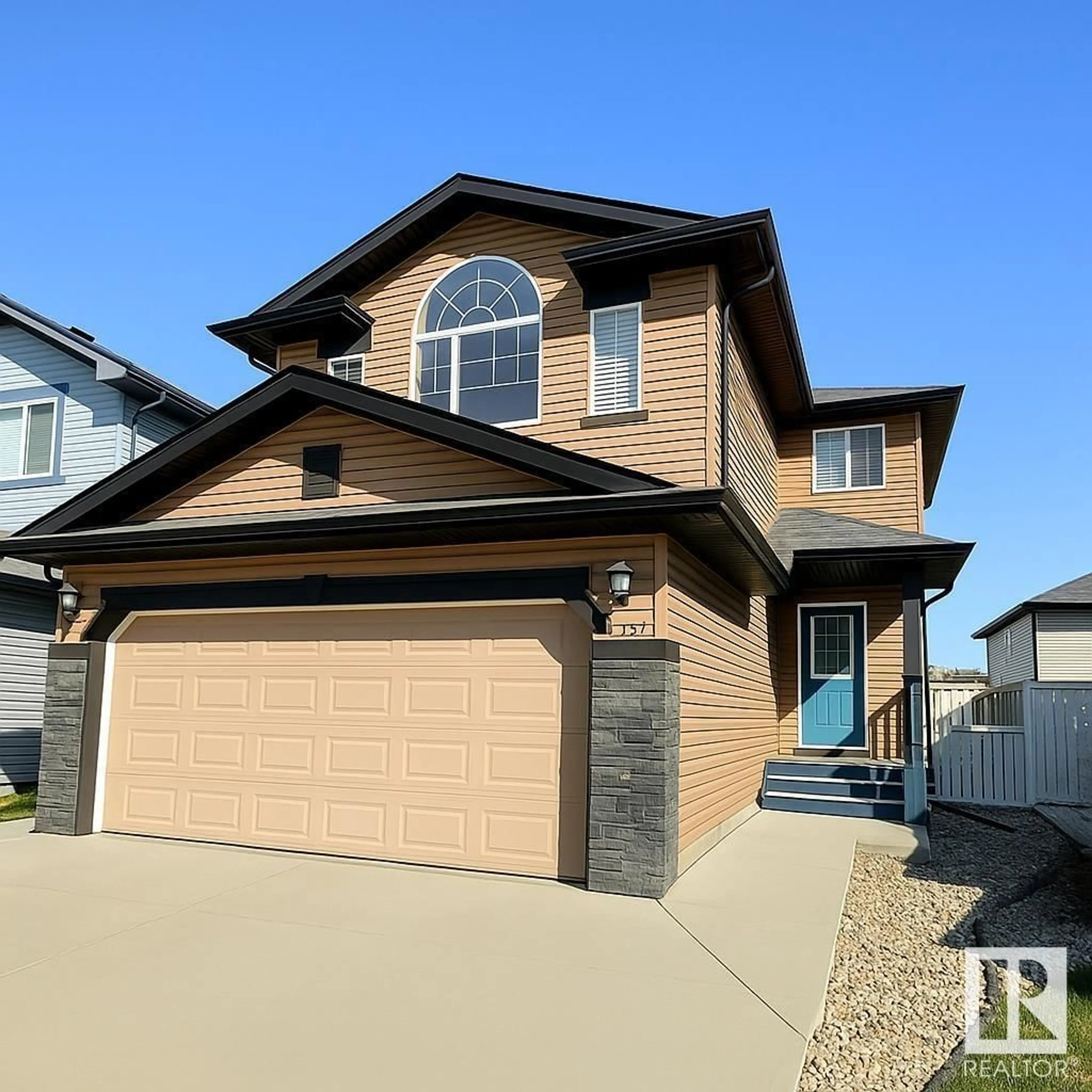 Home with vinyl exterior material, street for 8736 178 AV, Edmonton Alberta T5Z0B8