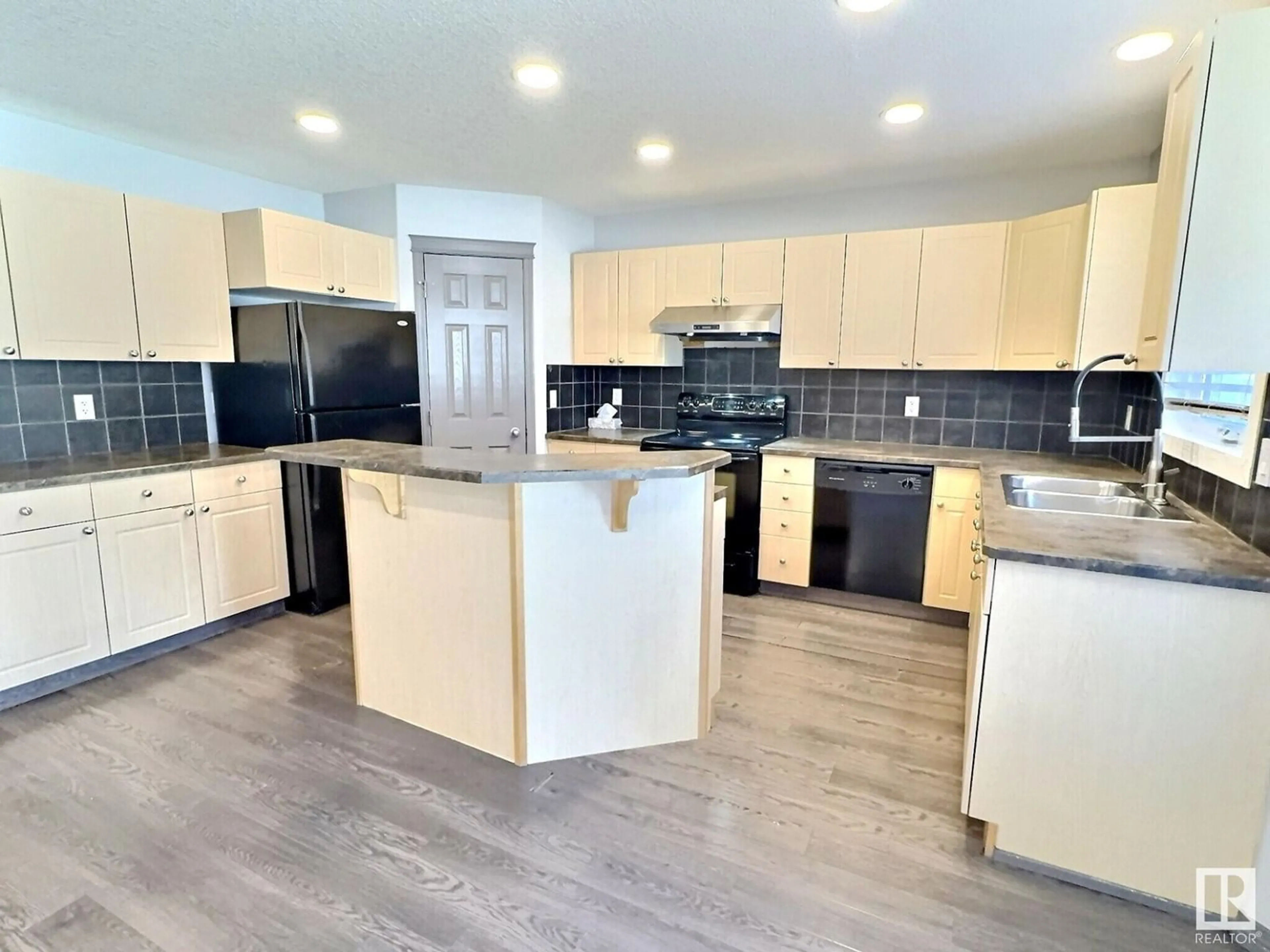 Open concept kitchen, unknown for 8736 178 AV, Edmonton Alberta T5Z0B8