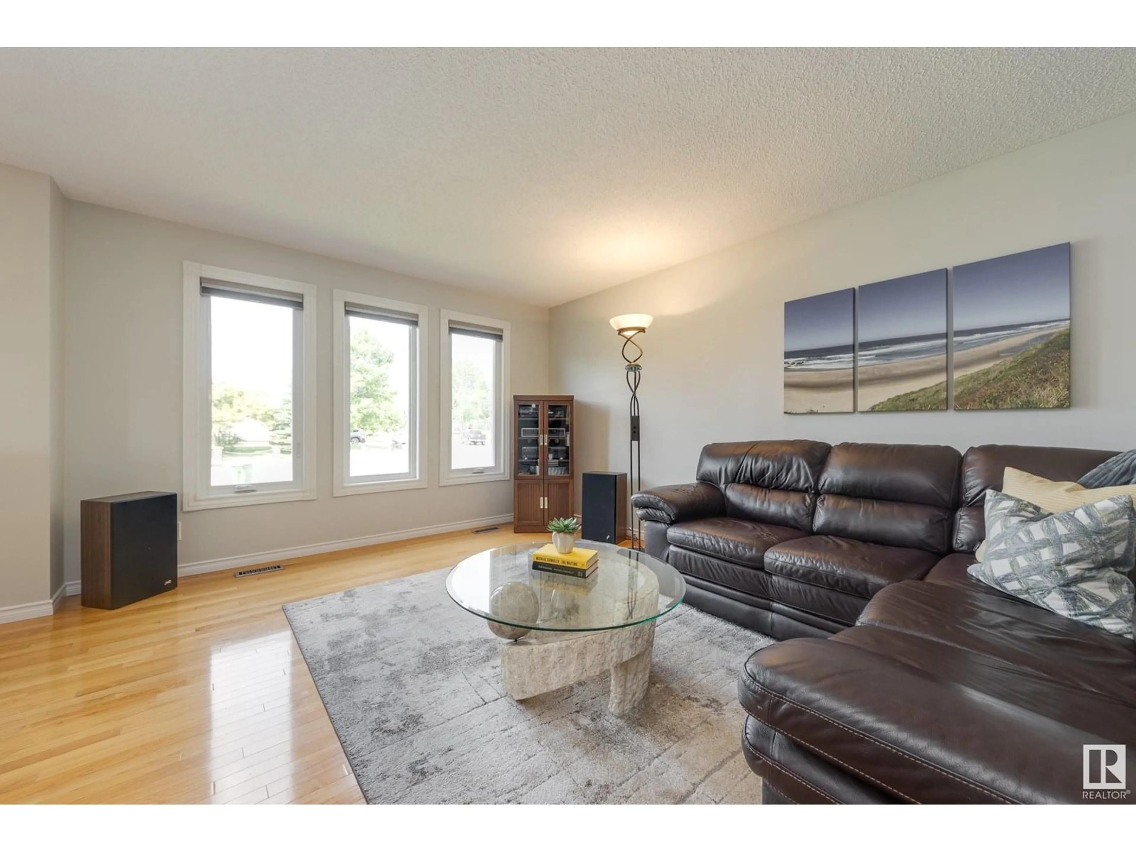 Living room with furniture, wood/laminate floor for 14711 29A ST, Edmonton Alberta T5Y2E4