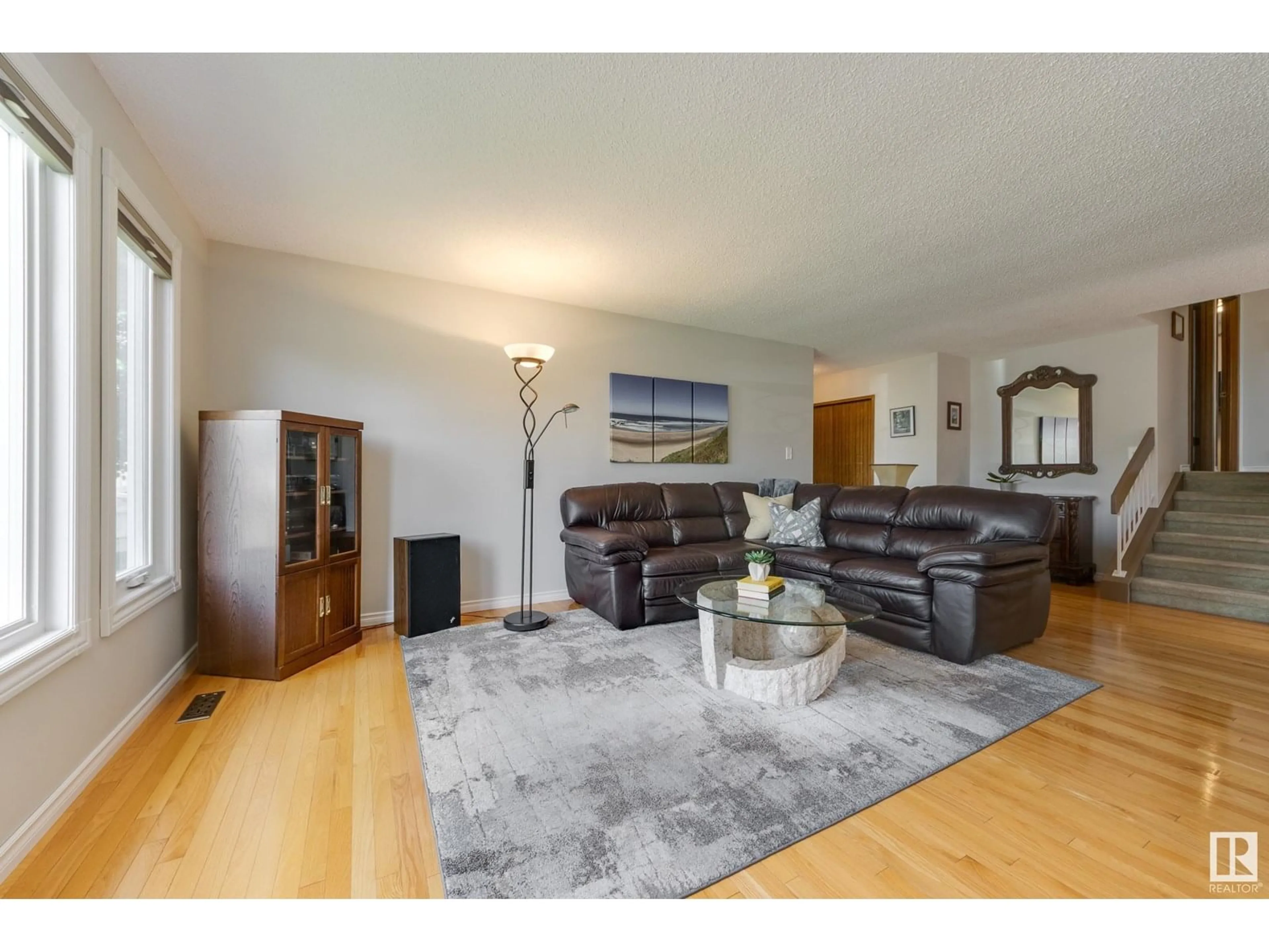Living room with furniture, wood/laminate floor for 14711 29A ST, Edmonton Alberta T5Y2E4