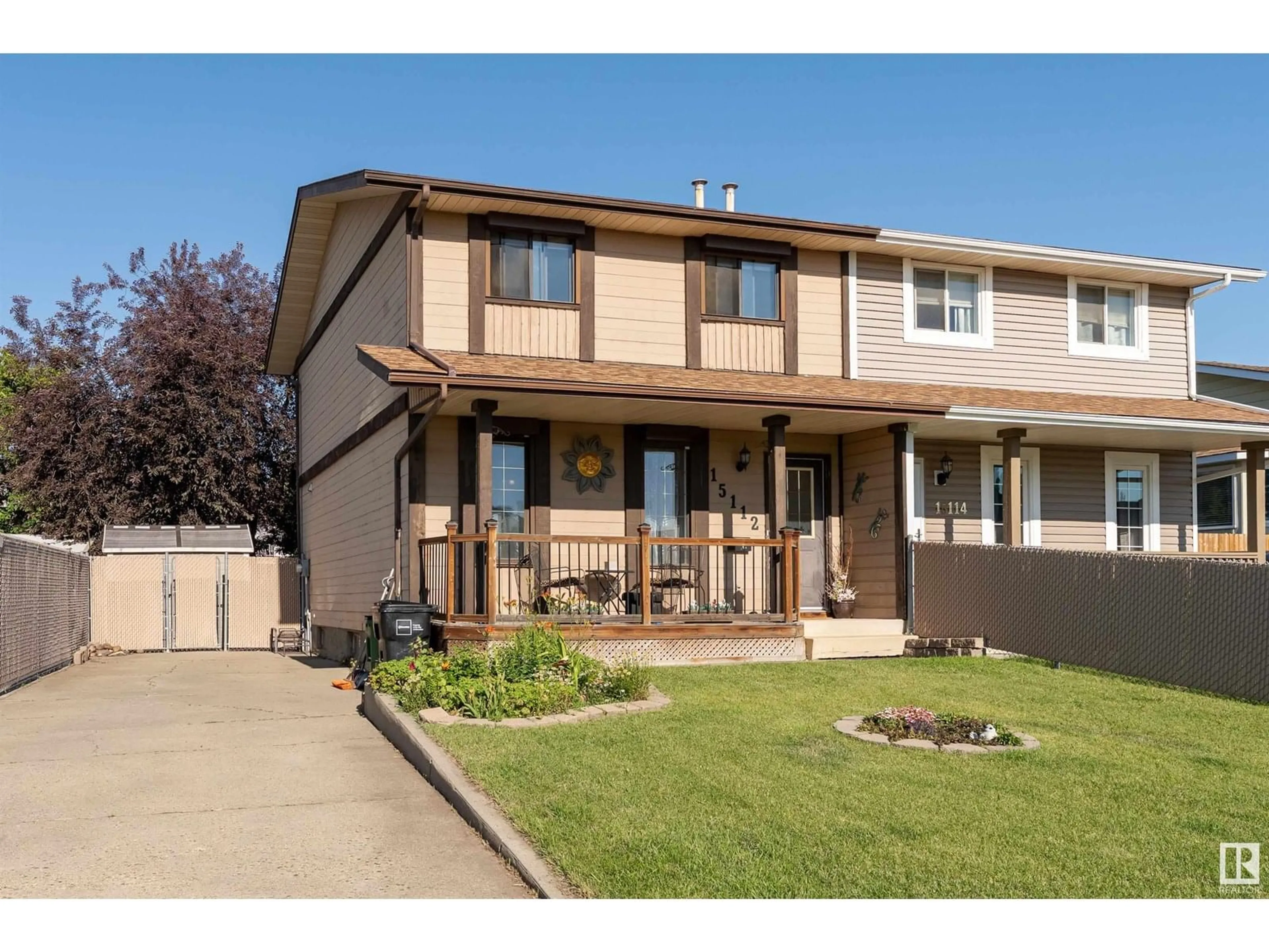 Home with vinyl exterior material, street for 15112 22 ST, Edmonton Alberta T5Y1Y9