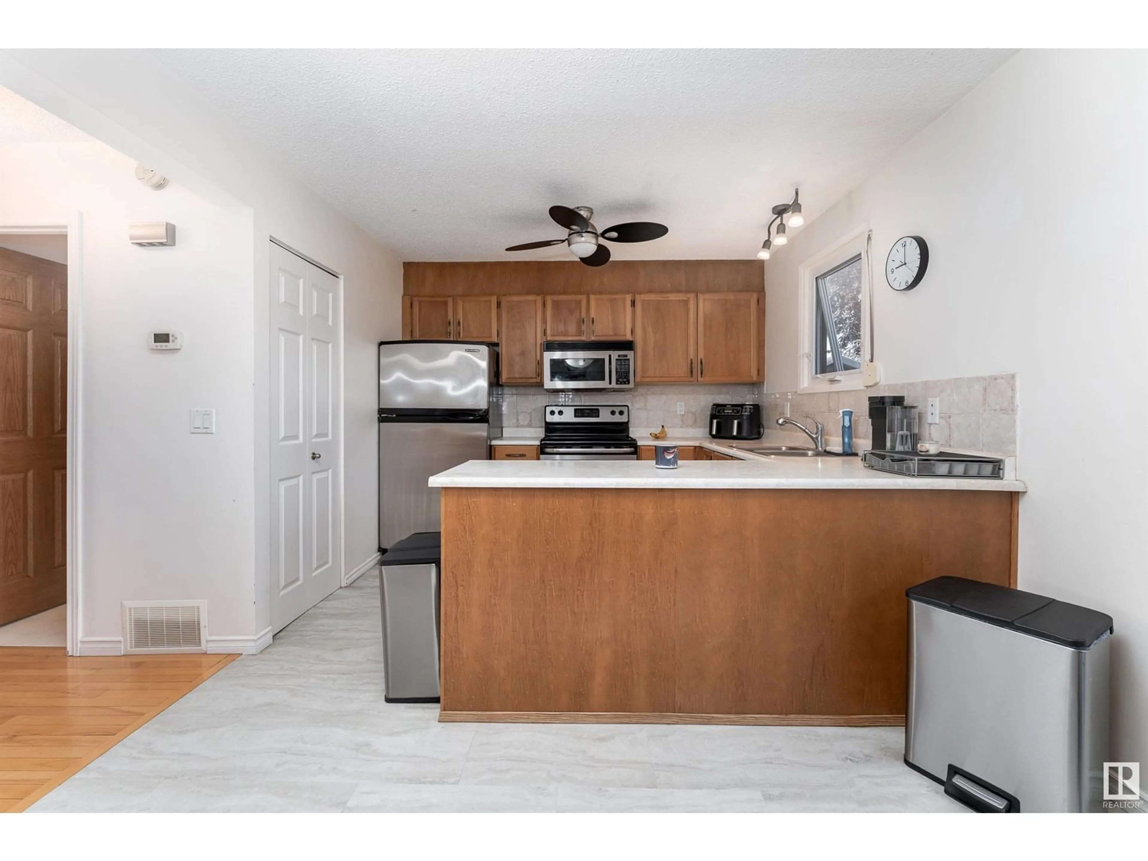 Open concept kitchen, unknown for 15112 22 ST, Edmonton Alberta T5Y1Y9