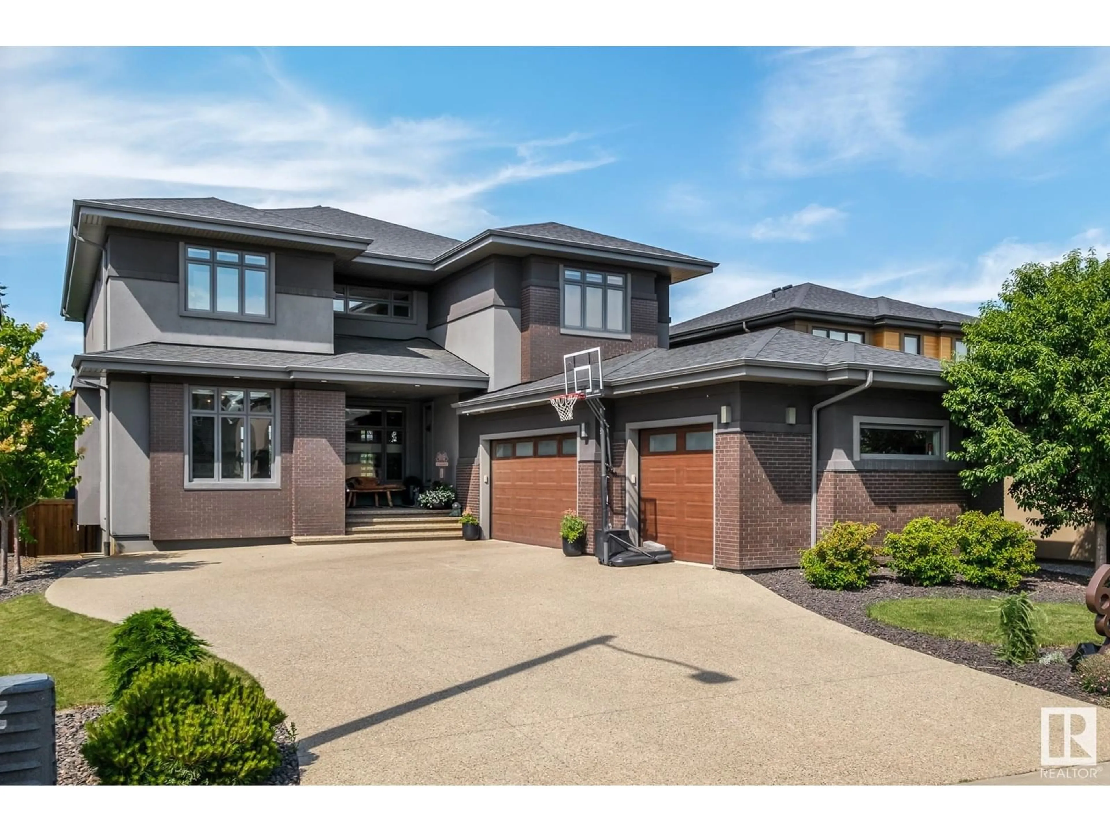 Home with brick exterior material, street for 699 HOWATT DR, Edmonton Alberta T6W3K3