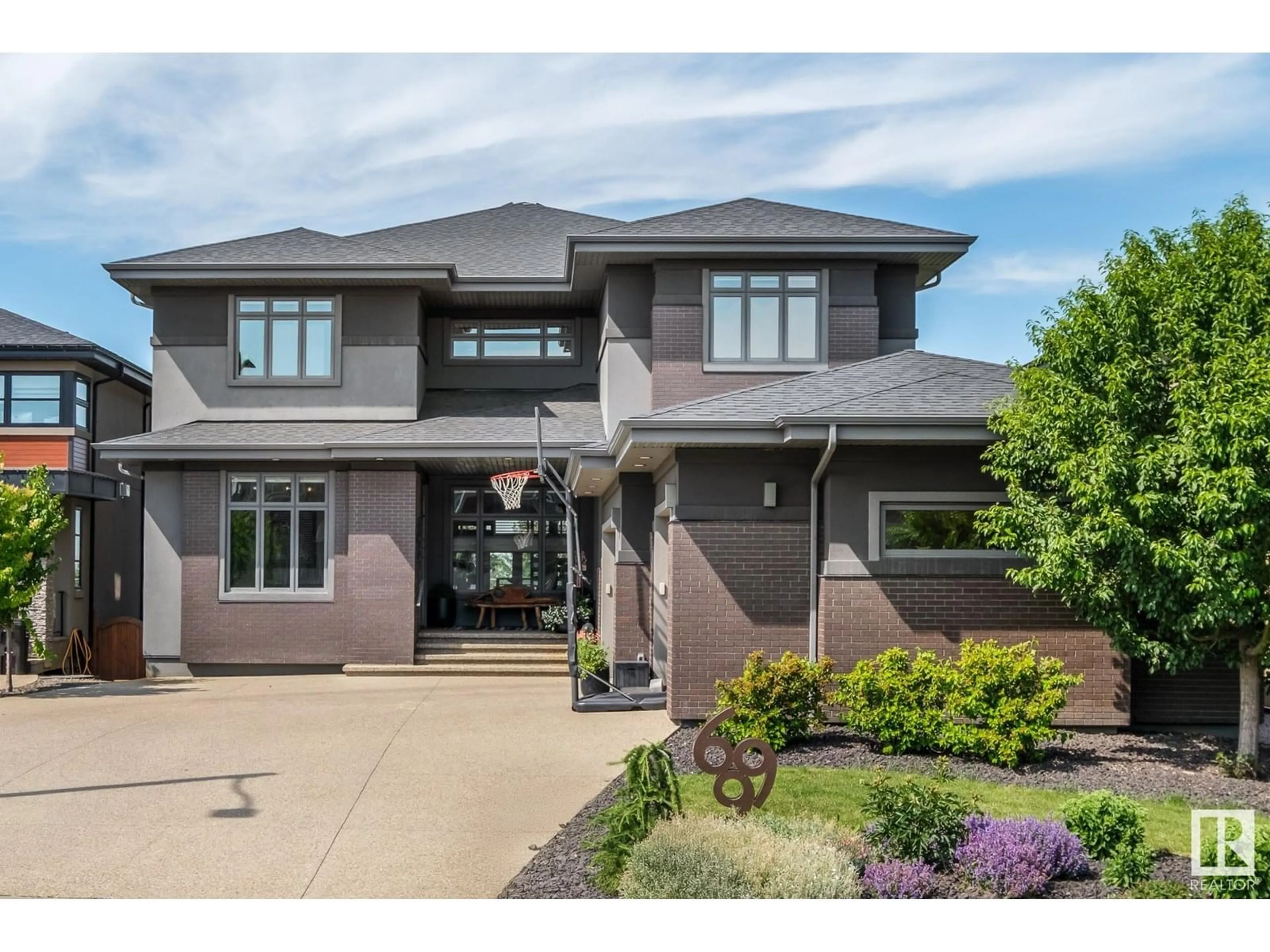 Home with brick exterior material, street for 699 HOWATT DR, Edmonton Alberta T6W3K3
