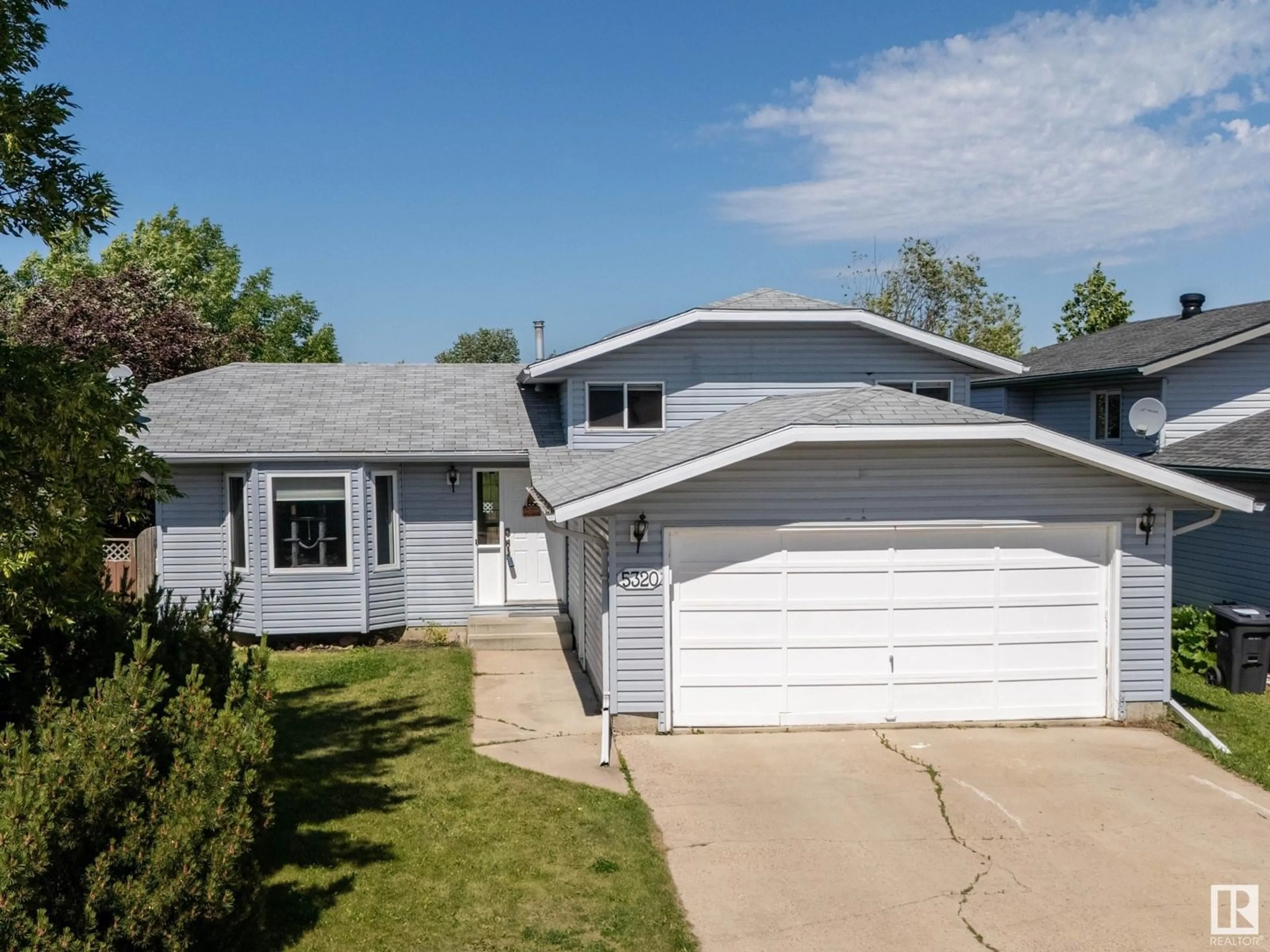 Home with vinyl exterior material, street for 5320 44 ST, Cold Lake Alberta T9M2B4
