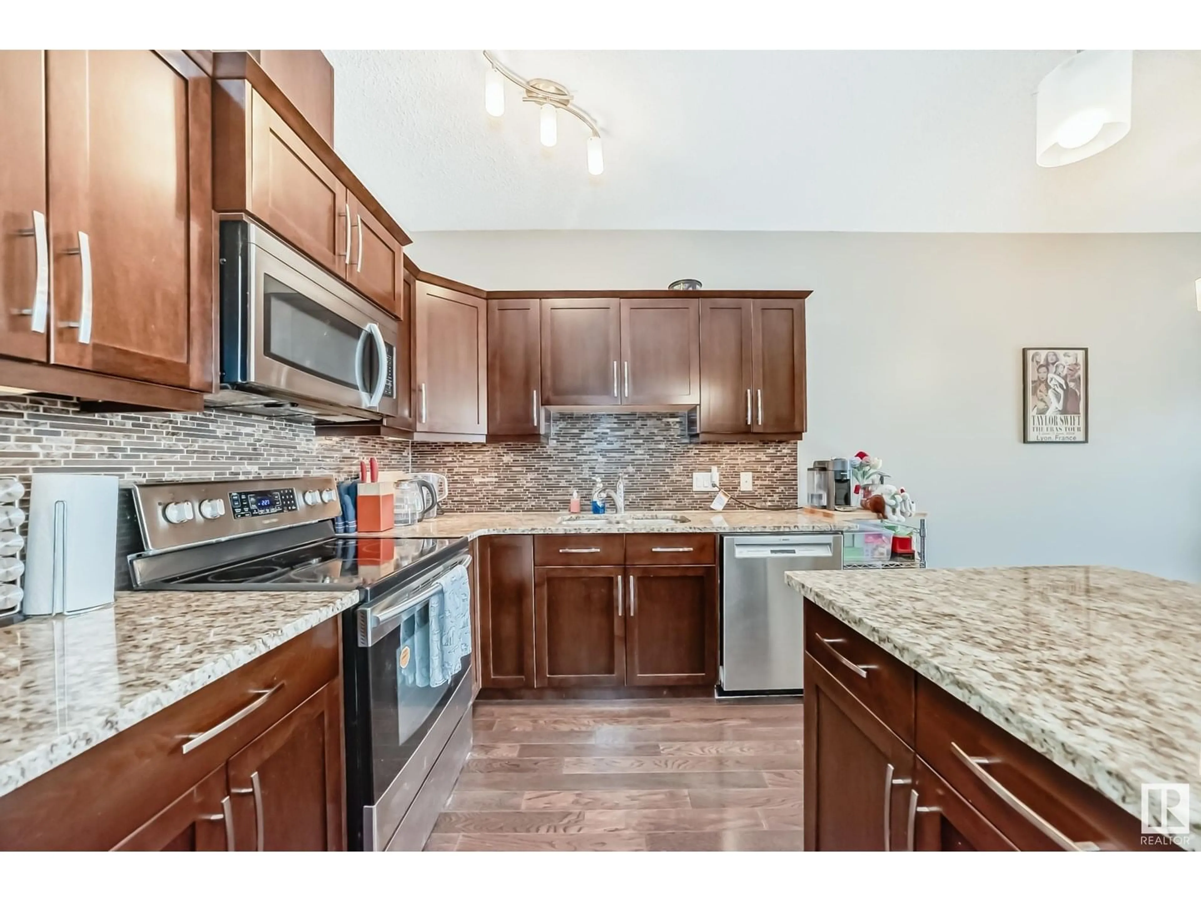Open concept kitchen, ceramic/tile floor for #417 - 10530 56 AV, Edmonton Alberta T6H0X7