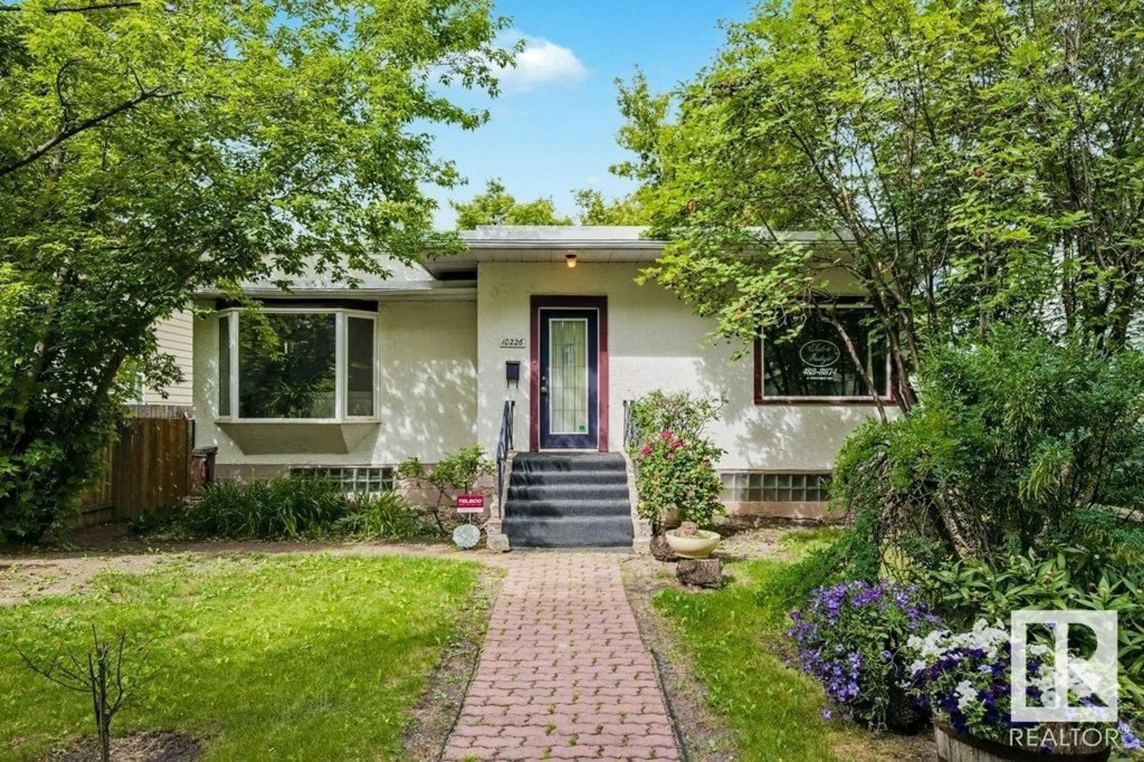 Home with brick exterior material, street for 10226 147 ST, Edmonton Alberta T5N3B9