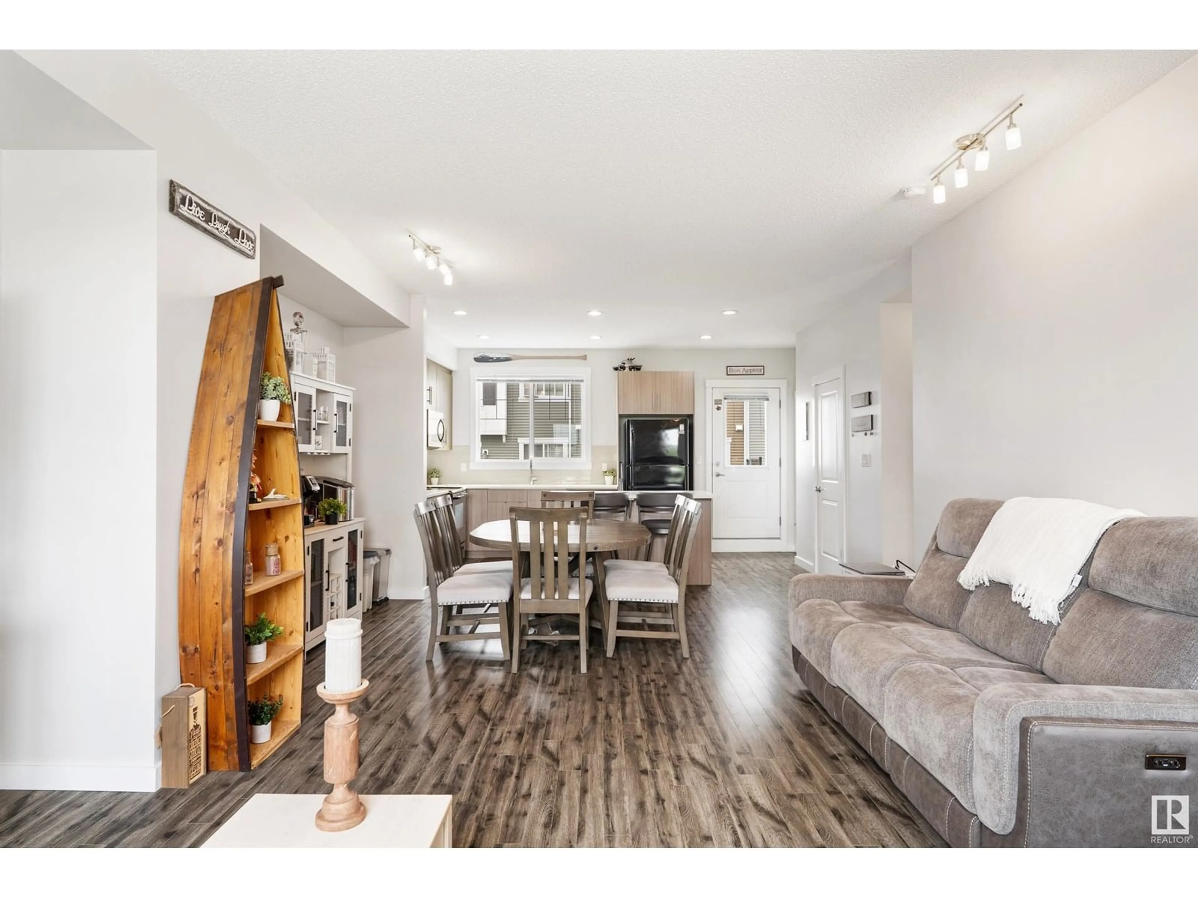 Living room with furniture, wood/laminate floor for 304 - 8530 94 ST, Fort Saskatchewan Alberta T8L0V8