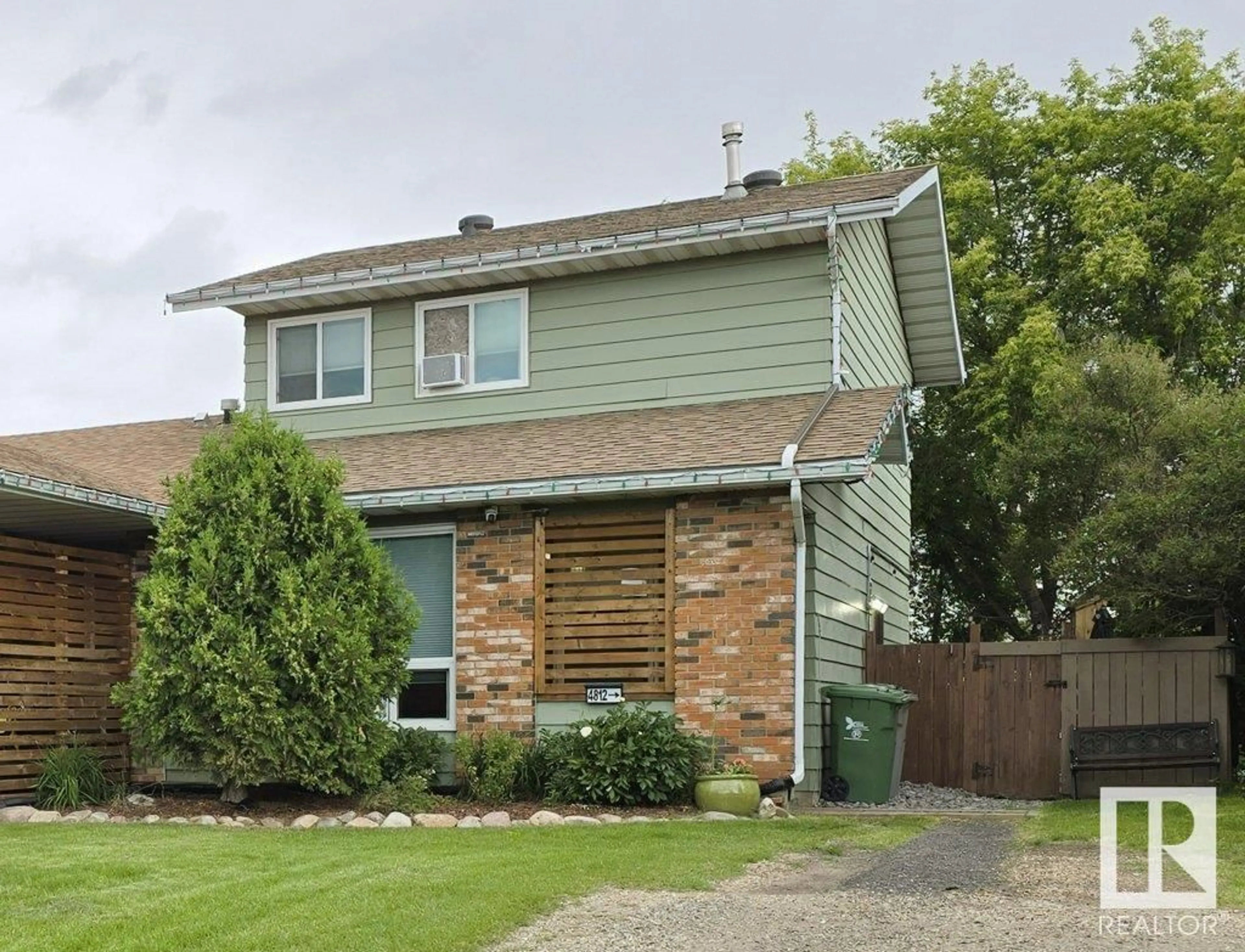 Home with vinyl exterior material, street for 4812 55 AV, Beaumont Alberta T4X1J8