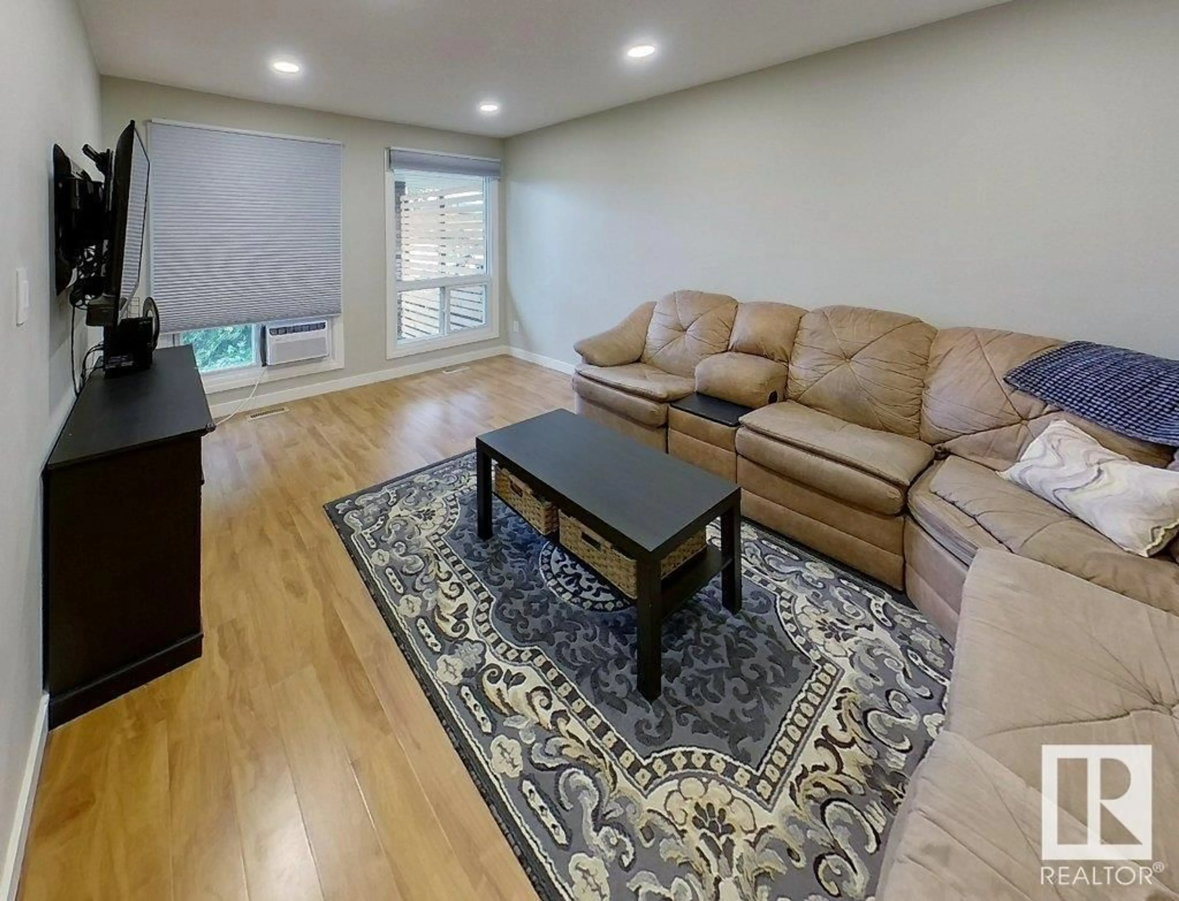 Living room with furniture, unknown for 4812 55 AV, Beaumont Alberta T4X1J8
