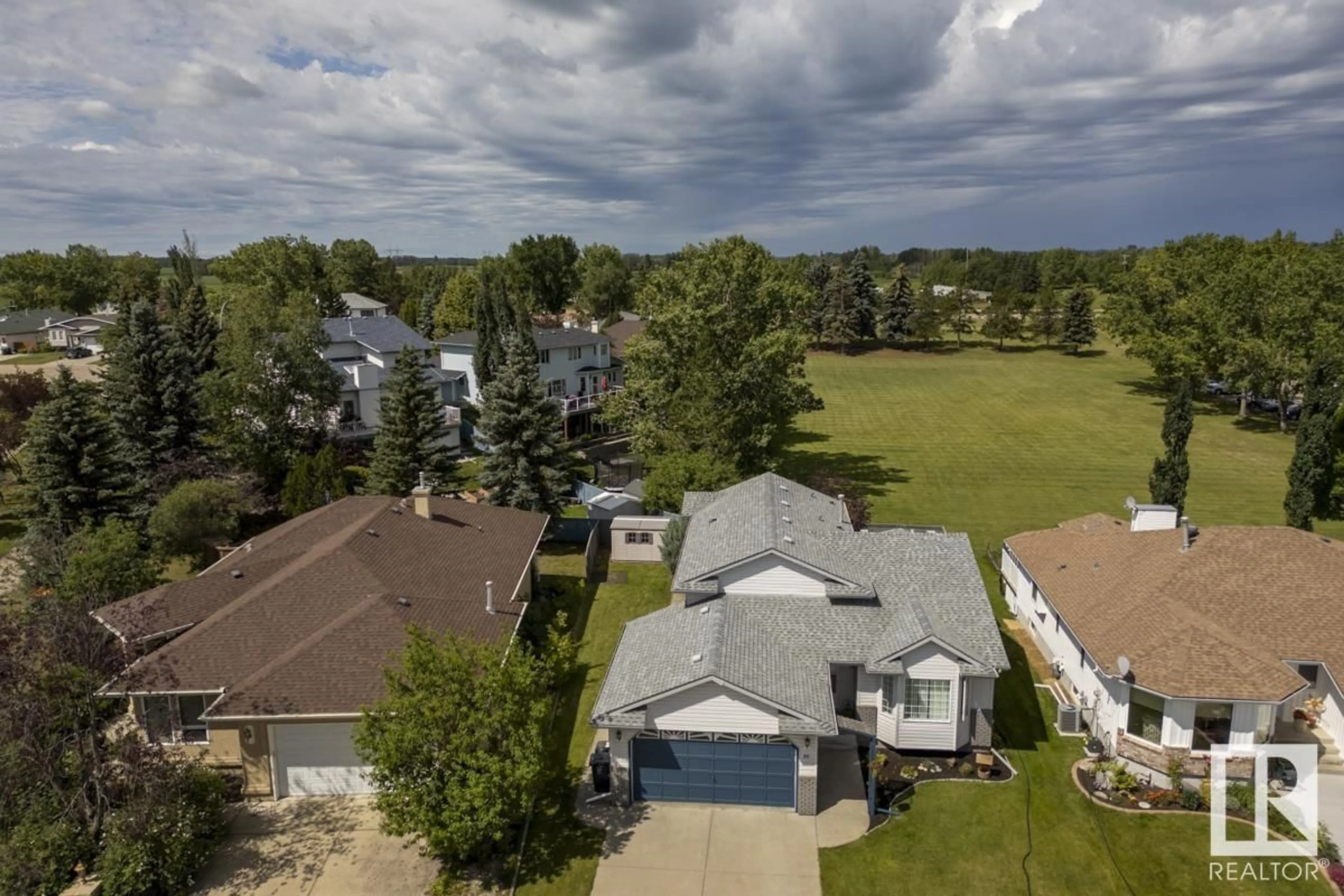 A pic from outside/outdoor area/front of a property/back of a property/a pic from drone, water/lake/river/ocean view for 90 HIGHWOOD BA, Devon Alberta T9G1W1