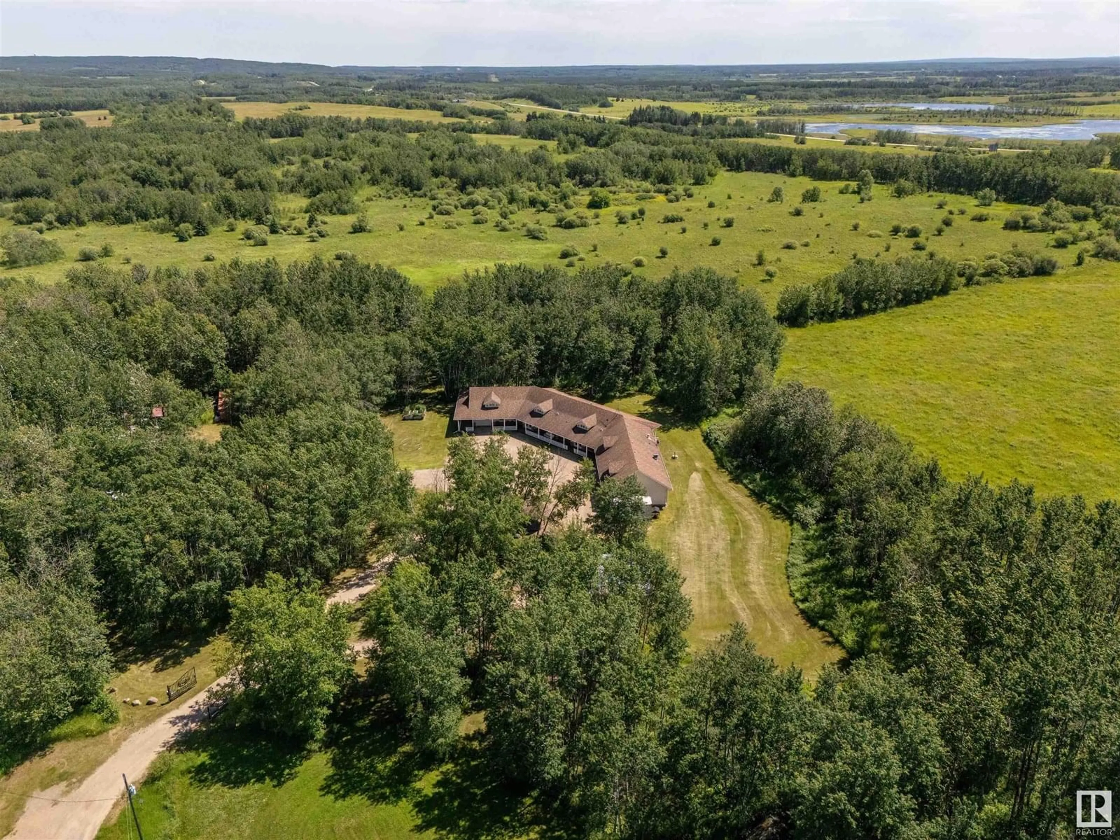 A pic from outside/outdoor area/front of a property/back of a property/a pic from drone, forest/trees view for 62313B - 1 RGE RD 421 RD, Rural Bonnyville M.D. Alberta T9M1P8