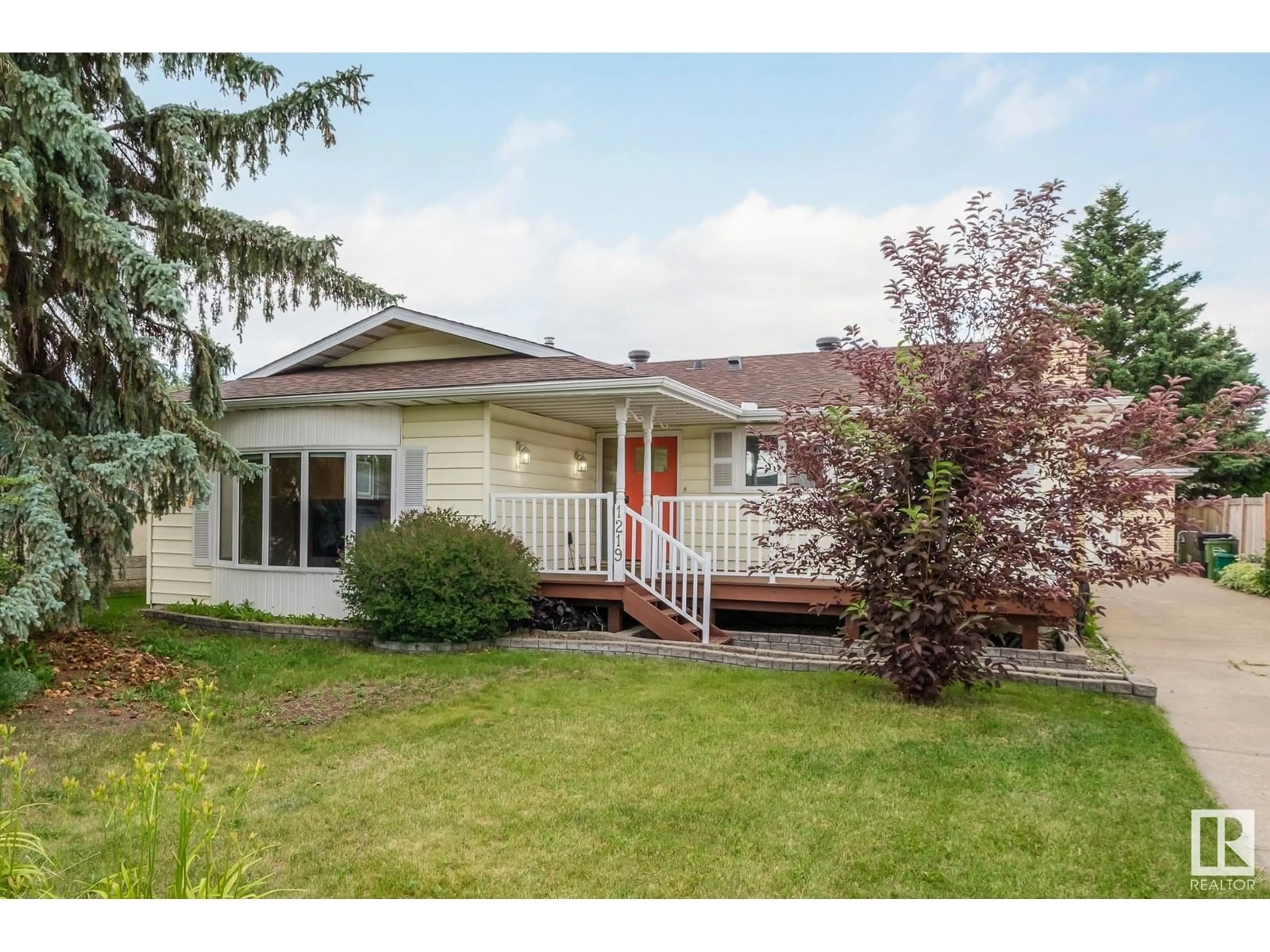 Home with vinyl exterior material, street for NW - 1219 85 ST, Edmonton Alberta T6K1X7