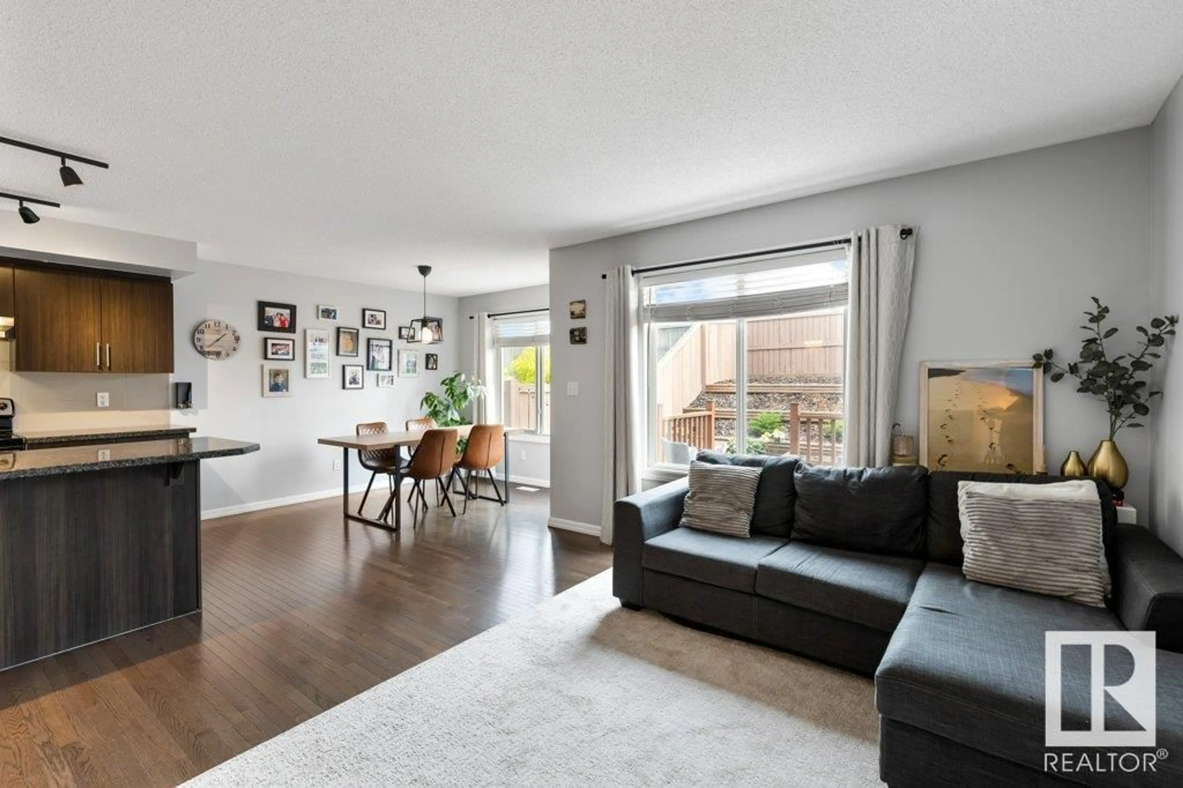 Living room with furniture, wood/laminate floor for 149 51 ST, Edmonton Alberta T6X0Z7