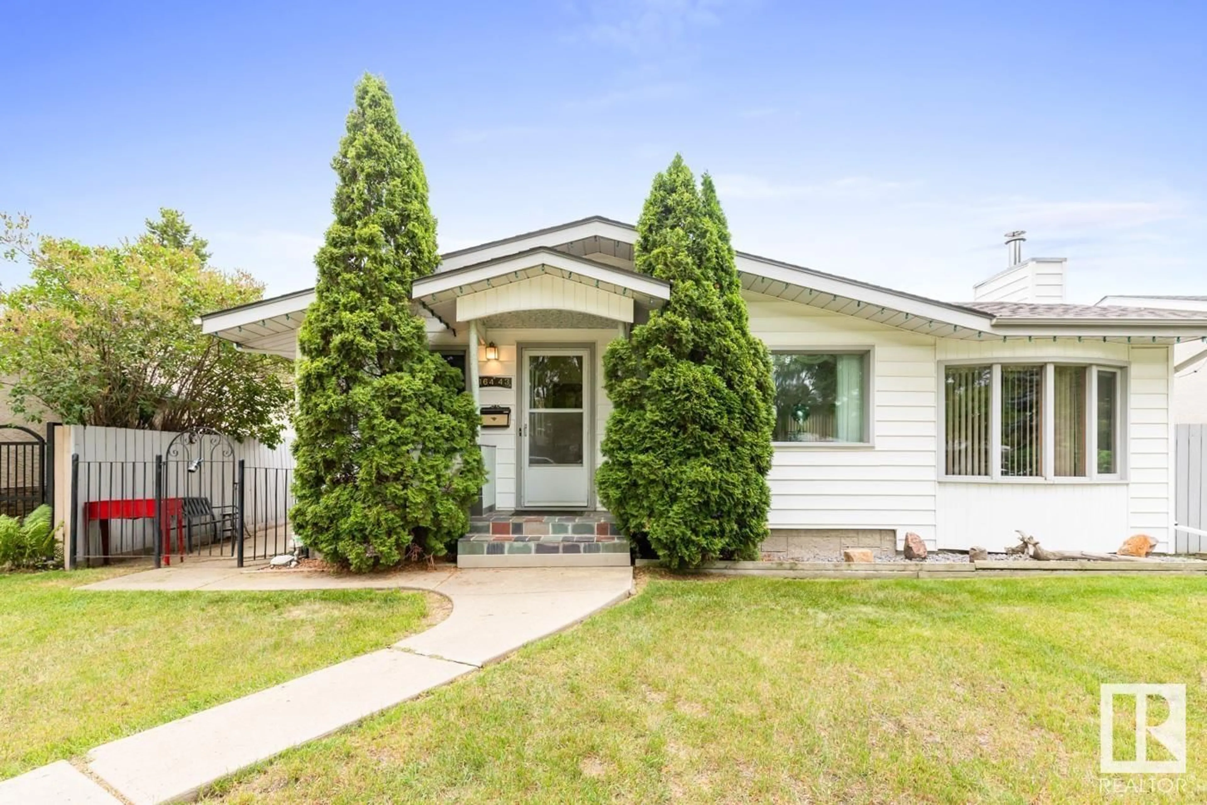 Home with vinyl exterior material, street for 16443 104A AV, Edmonton Alberta T5P0T3