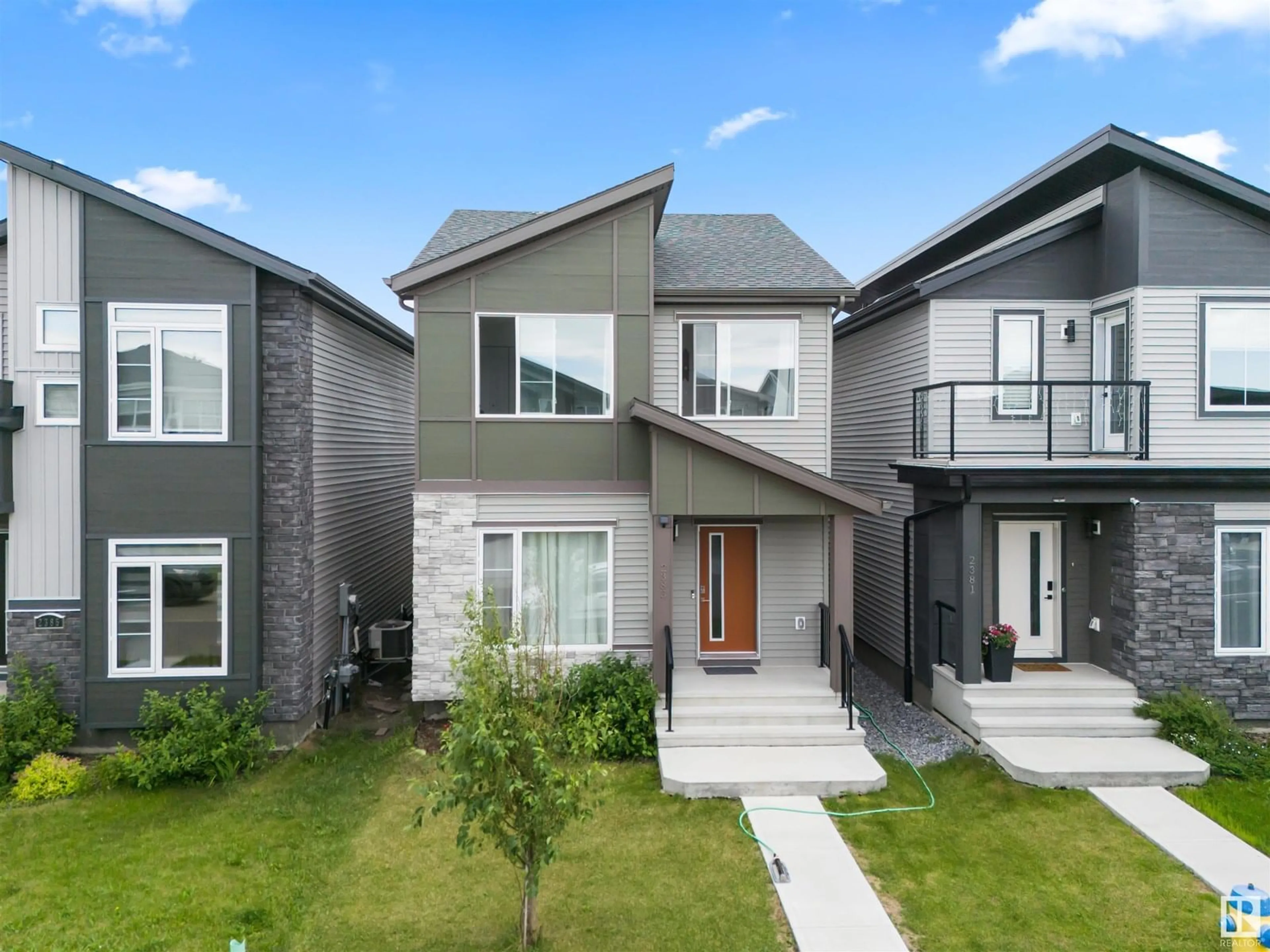 Home with vinyl exterior material, street for 2383 KELLY CI, Edmonton Alberta T6W4G3