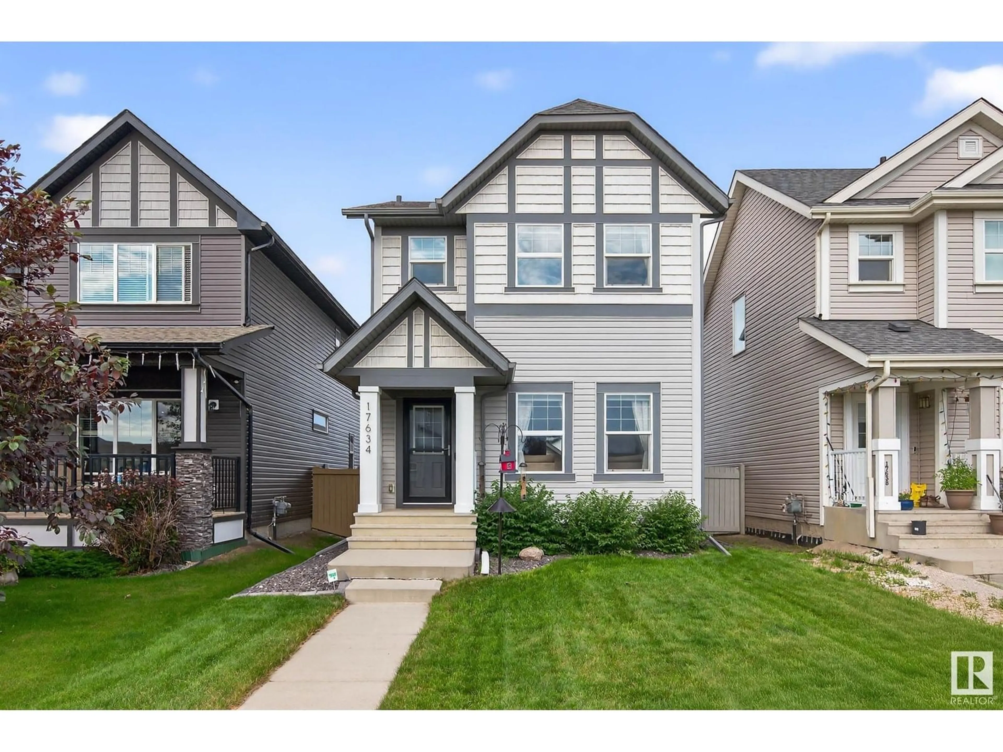 Home with vinyl exterior material, street for NW - 17634 61A ST, Edmonton Alberta T5Y3N9