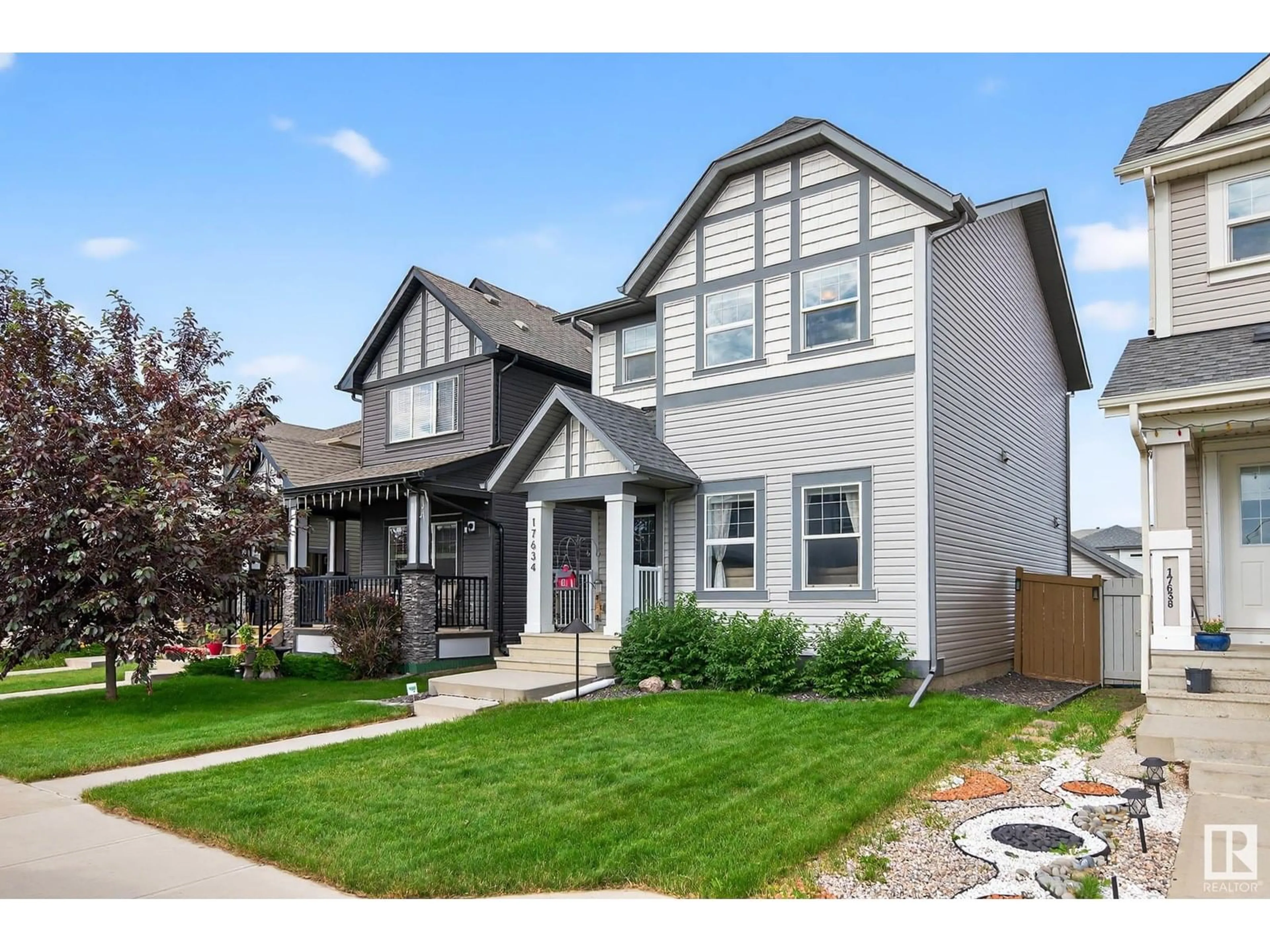 Home with vinyl exterior material, street for NW - 17634 61A ST, Edmonton Alberta T5Y3N9