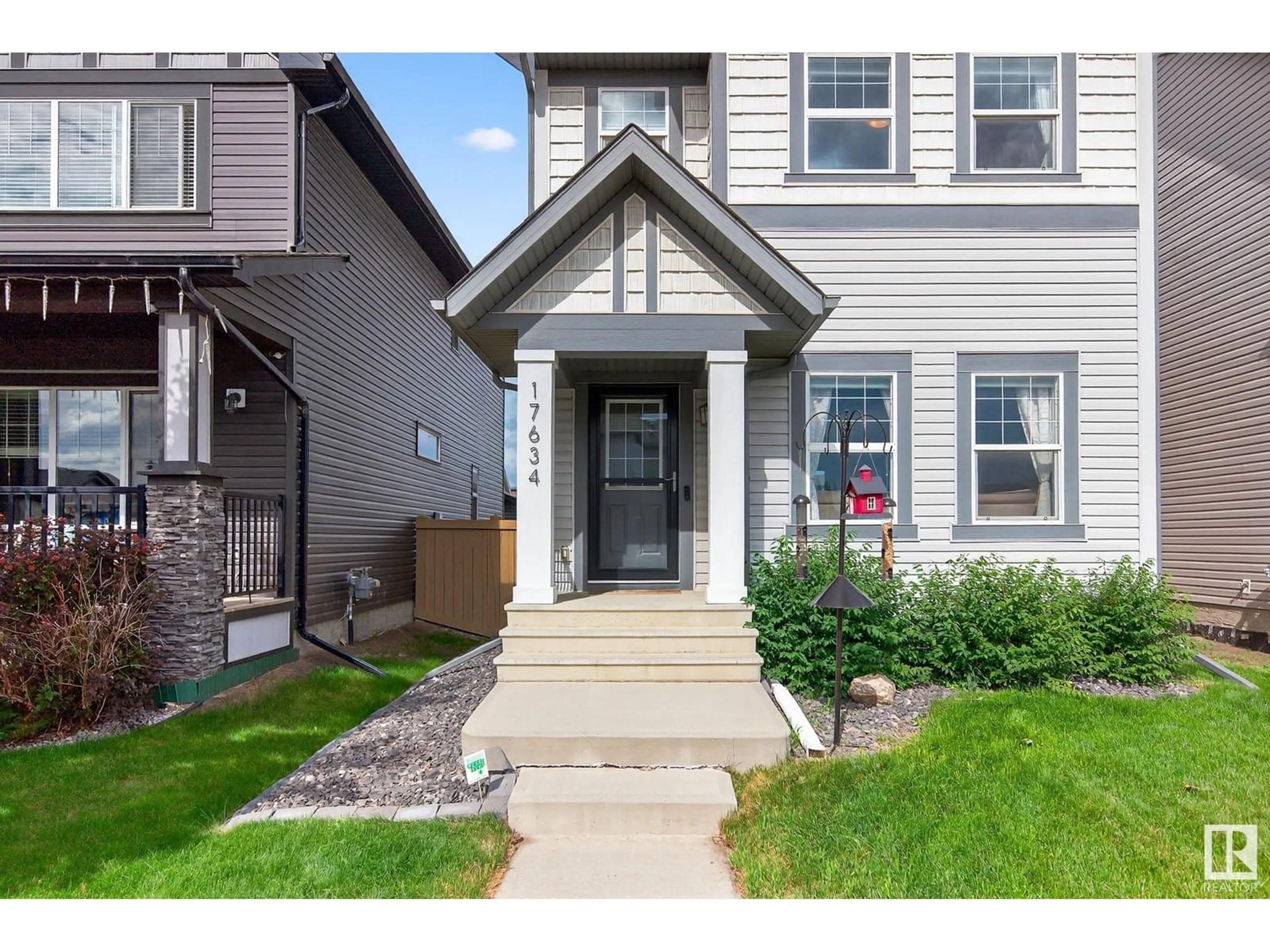 Home with vinyl exterior material, street for NW - 17634 61A ST, Edmonton Alberta T5Y3N9