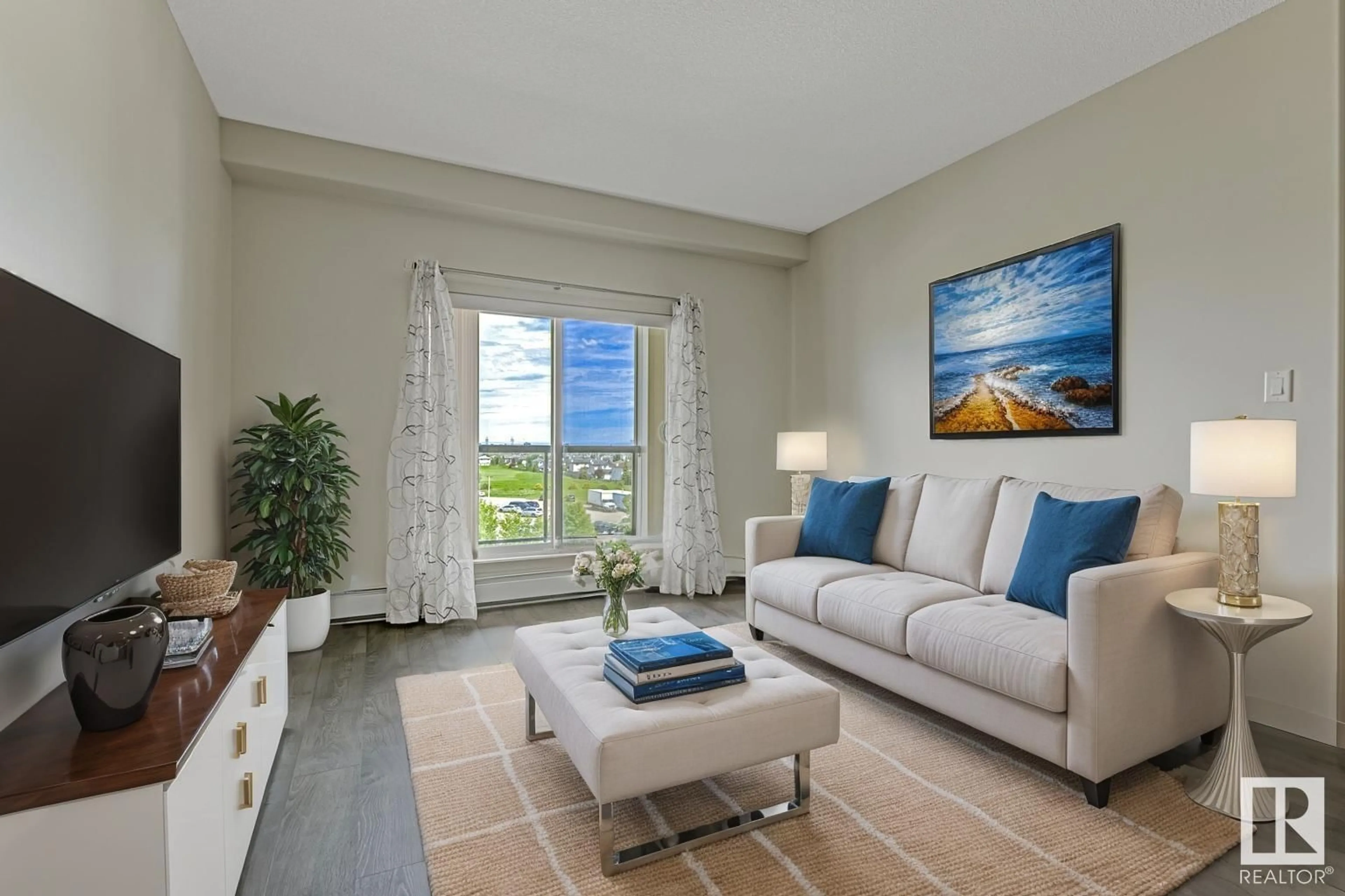 Living room with furniture, unknown for 11517 - 450 ELLERSLIE RD, Edmonton Alberta T6W2A9
