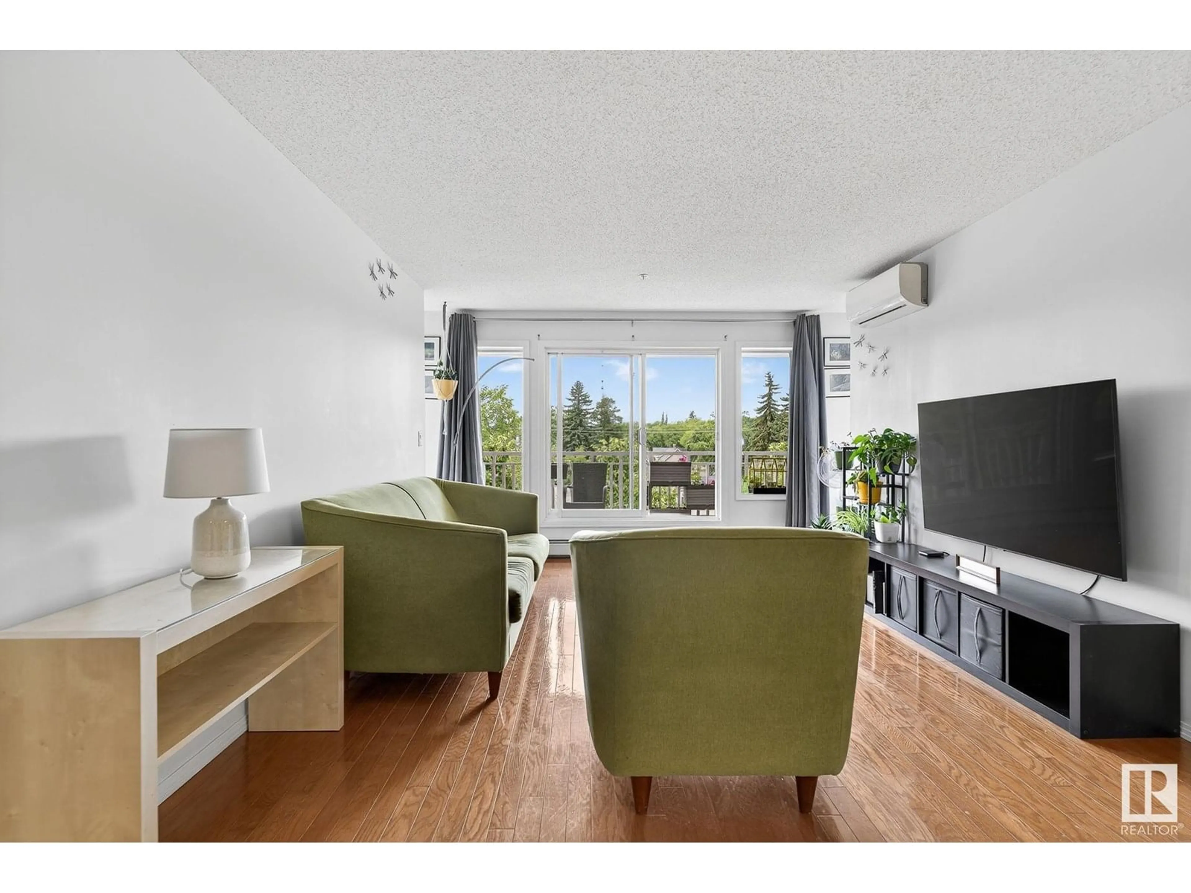 Living room with furniture, unknown for 410 - 10951 124 ST, Edmonton Alberta T5M4E1