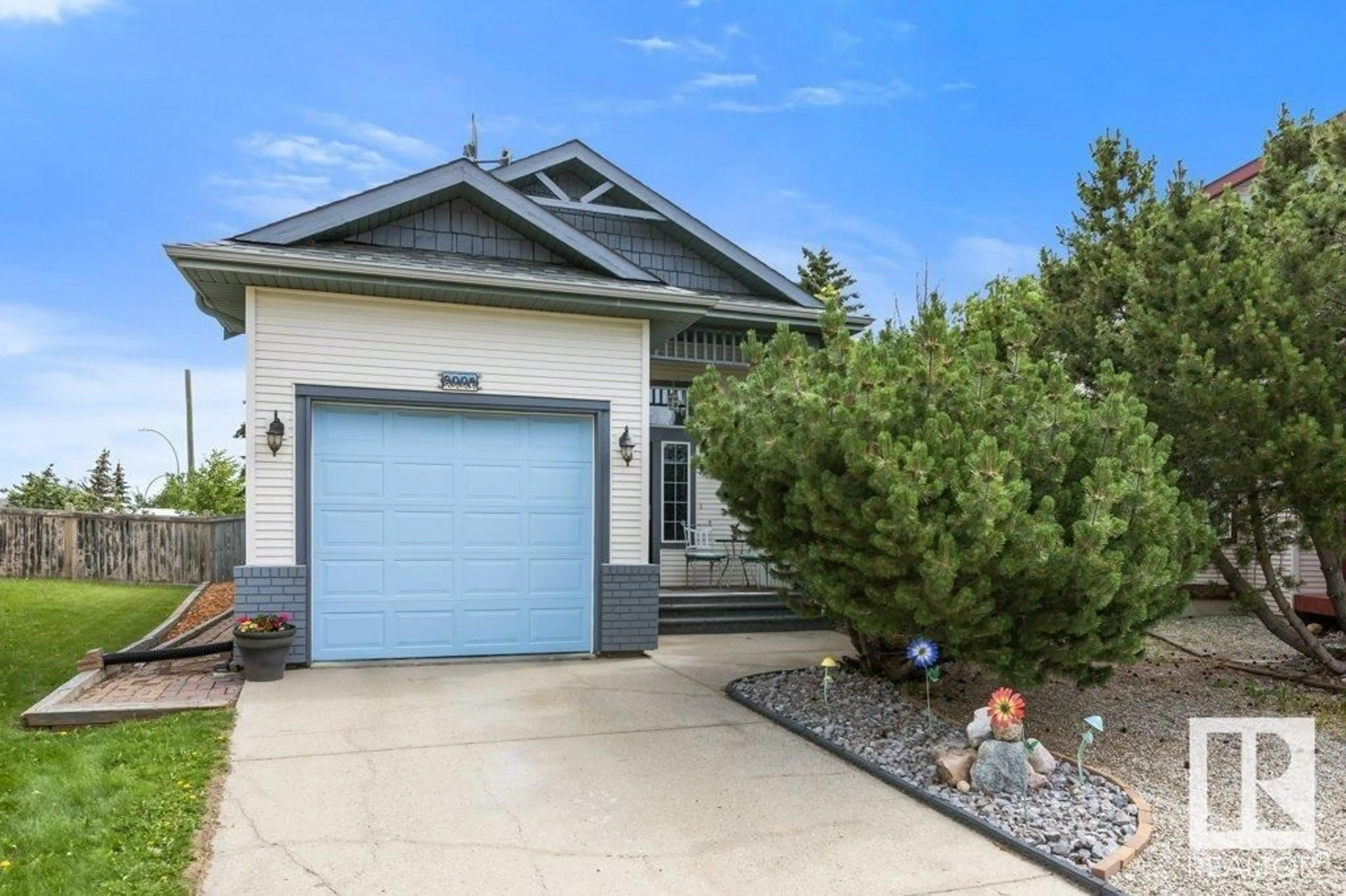 Home with vinyl exterior material, street for NW - 9004 166 AV, Edmonton Alberta T5Z3H5