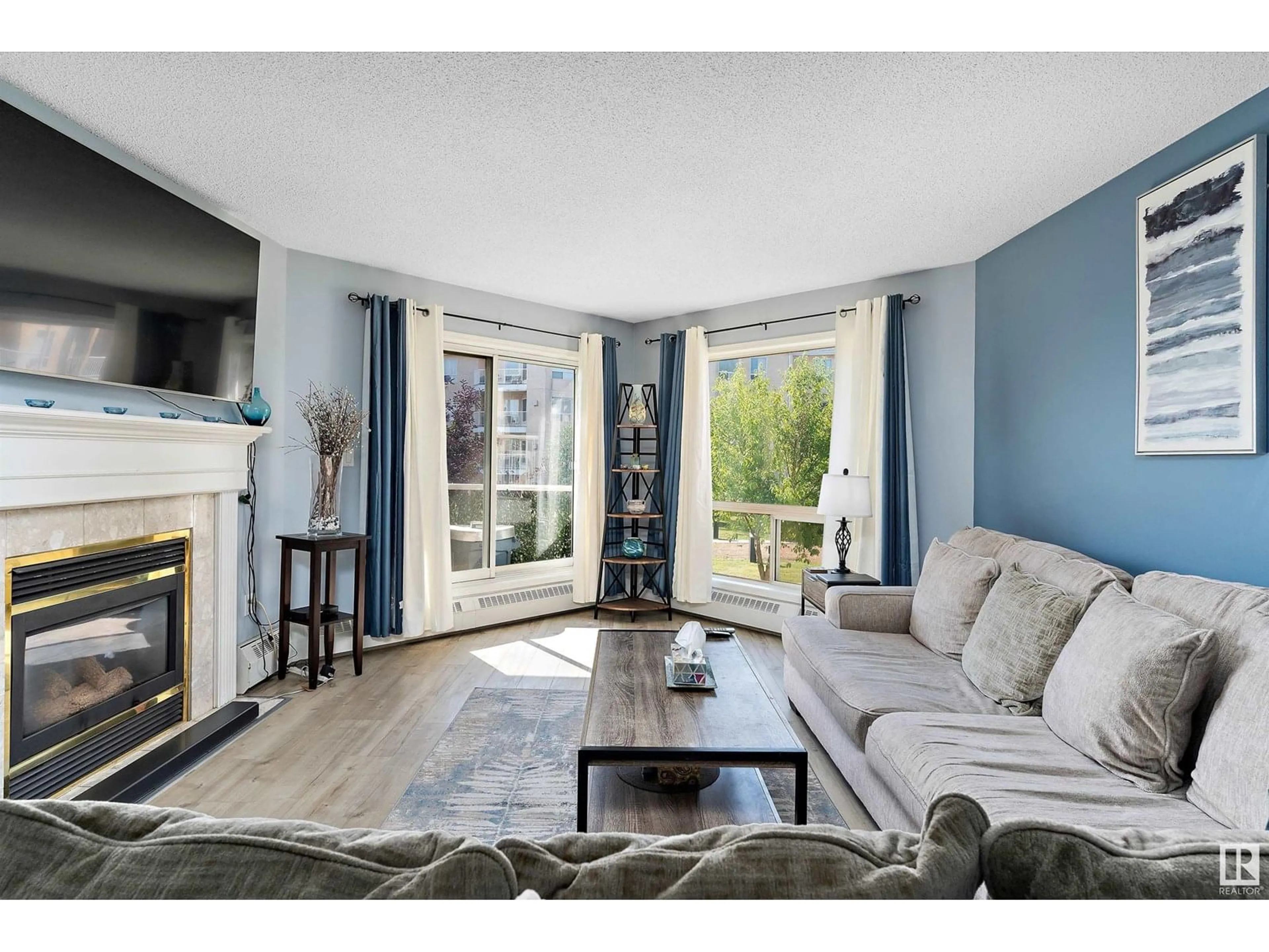 Living room with furniture, unknown for 212 - 15499 CASTLE DOWNS RD, Edmonton Alberta T5X5Y3
