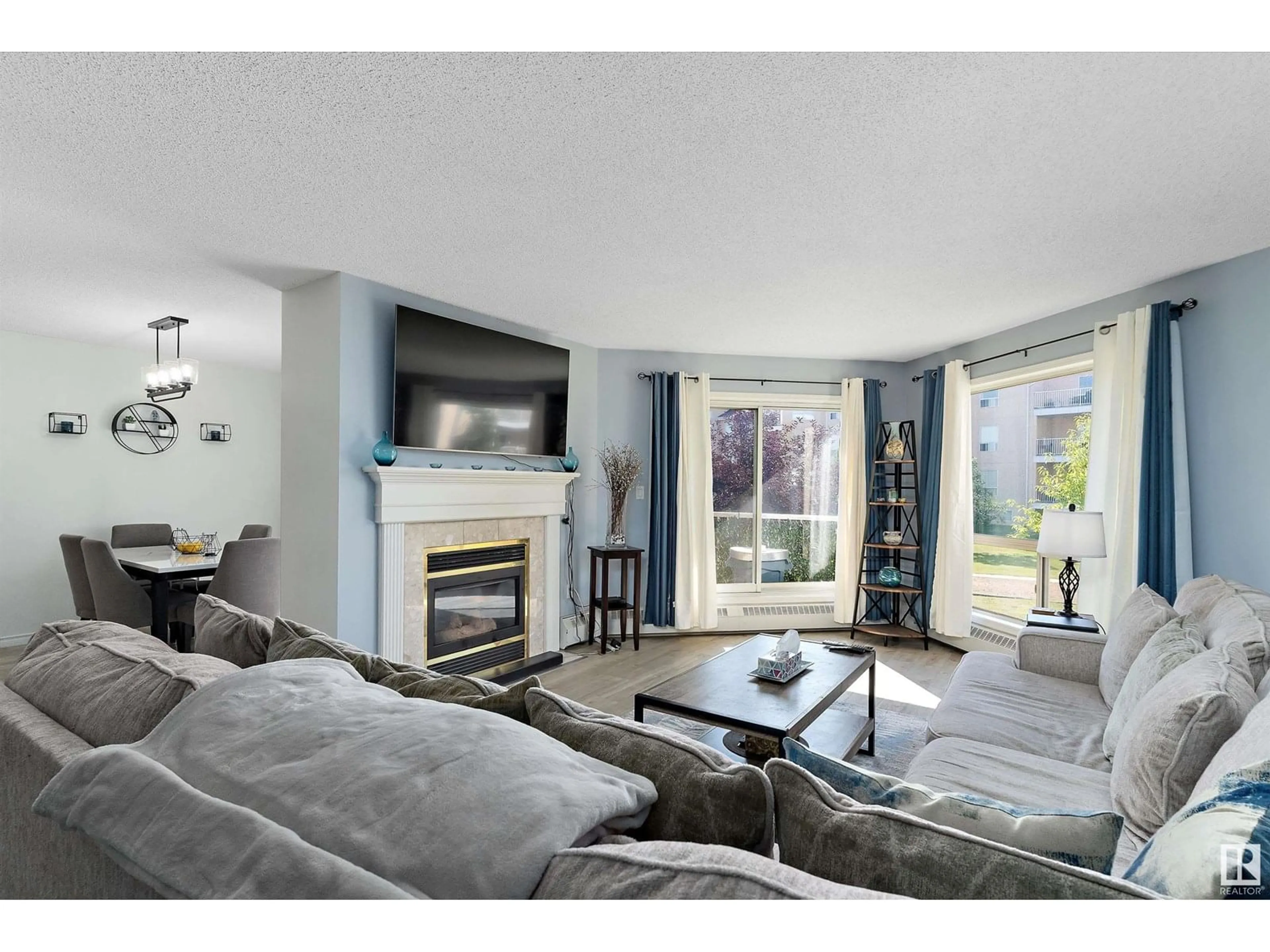 Living room with furniture, unknown for 212 - 15499 CASTLE DOWNS RD, Edmonton Alberta T5X5Y3