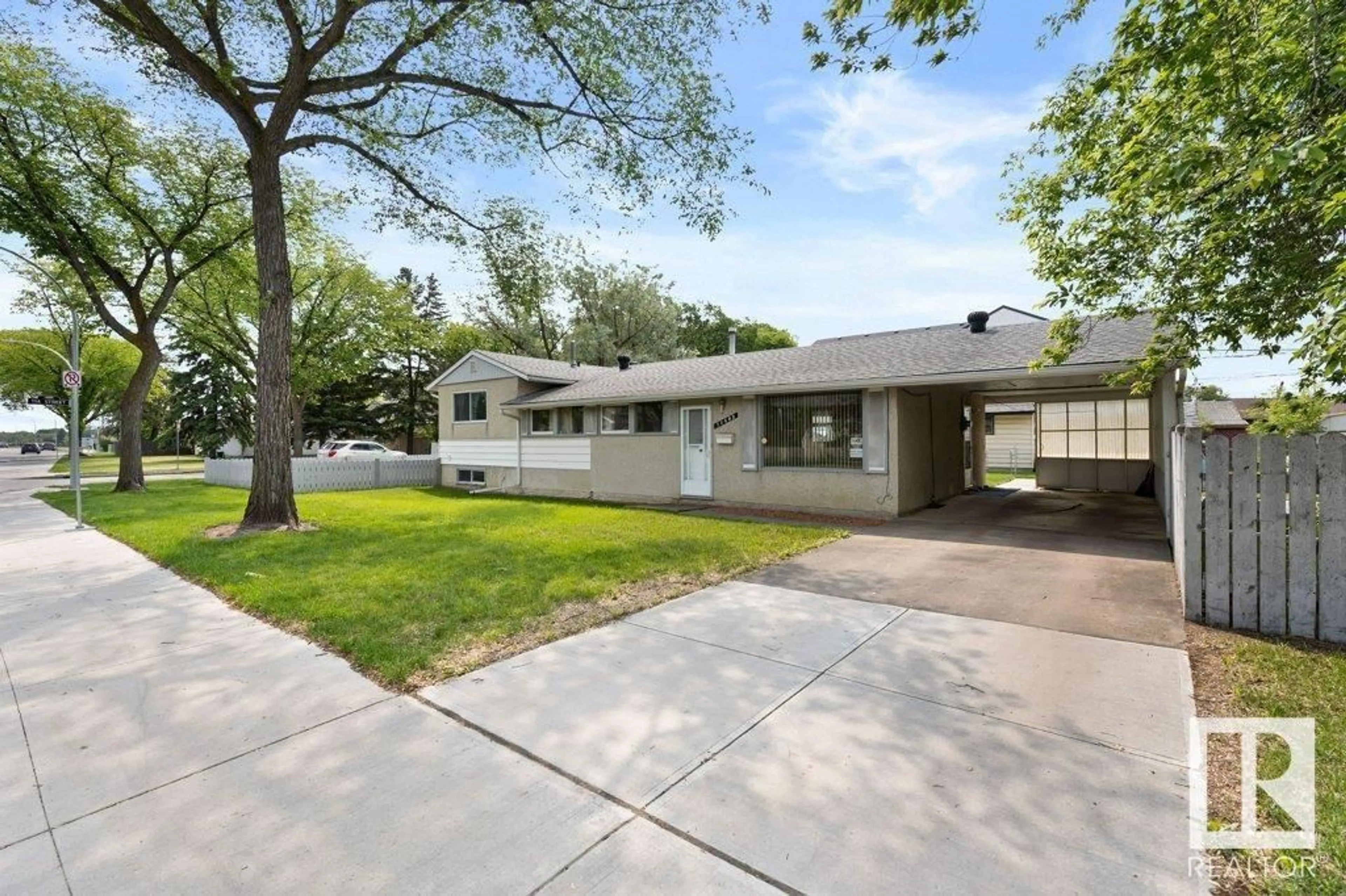 Home with brick exterior material, street for 11403 129 AV, Edmonton Alberta T5E0M2
