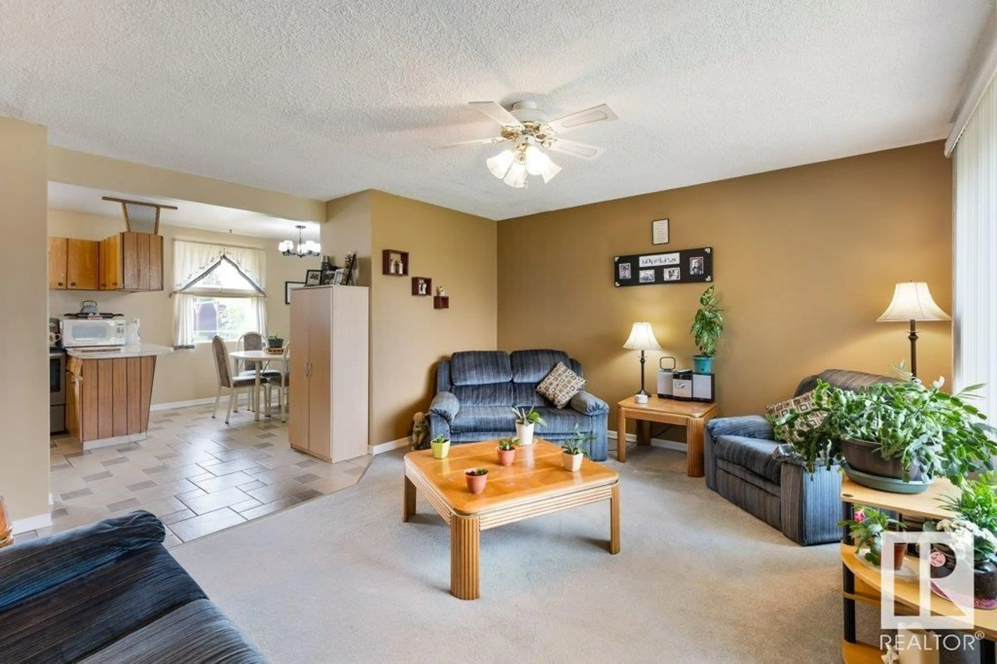 Living room with furniture, unknown for 11403 129 AV, Edmonton Alberta T5E0M2