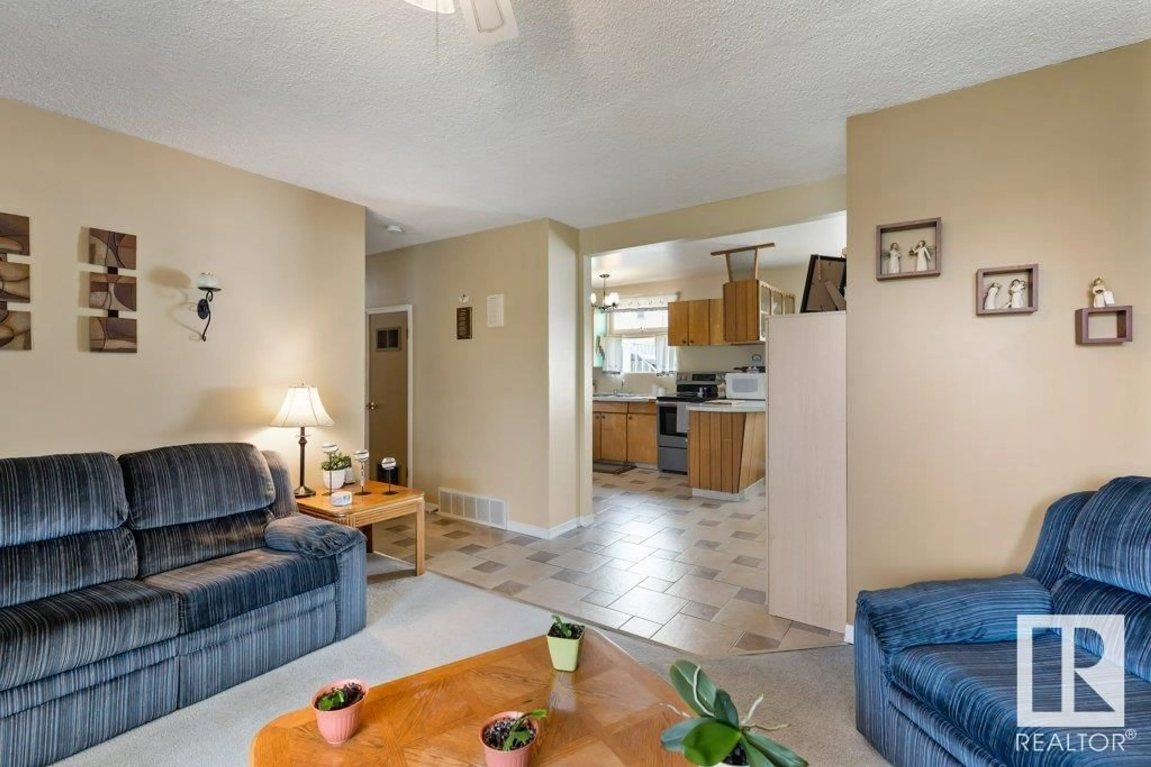 Living room with furniture, unknown for 11403 129 AV, Edmonton Alberta T5E0M2