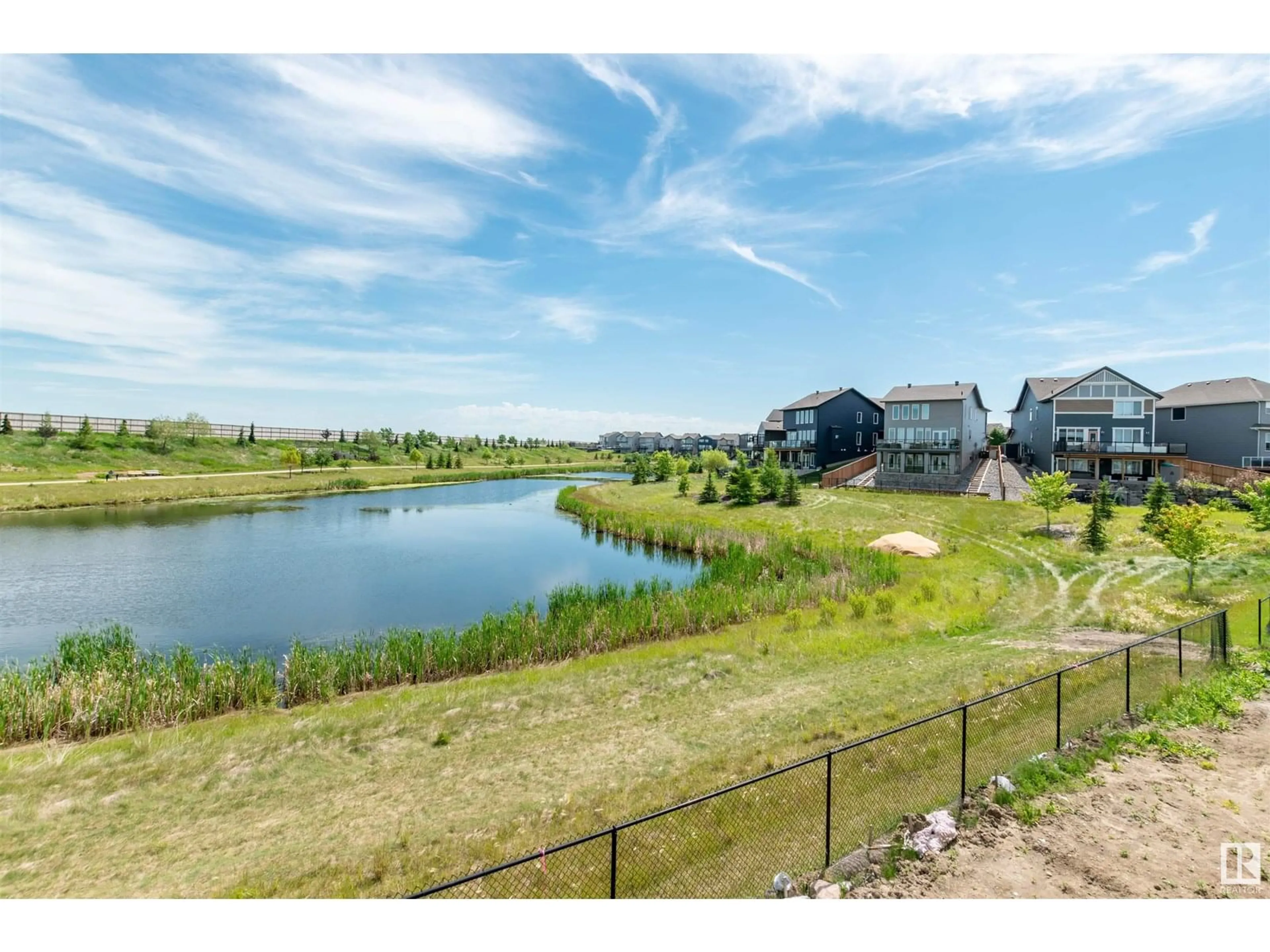 A pic from outside/outdoor area/front of a property/back of a property/a pic from drone, water/lake/river/ocean view for 57 SAVOY CR, Sherwood Park Alberta T8H2Y3