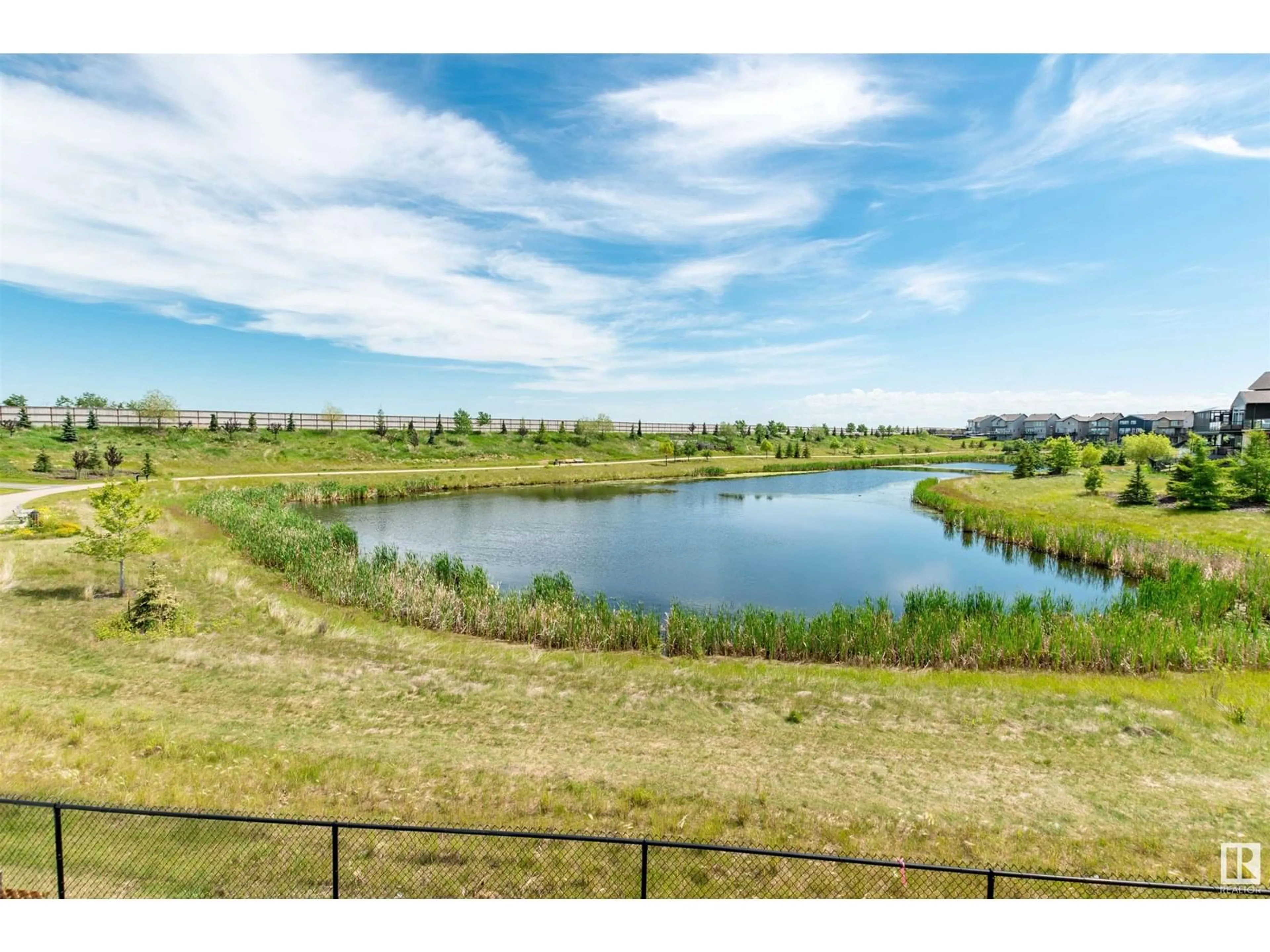 A pic from outside/outdoor area/front of a property/back of a property/a pic from drone, water/lake/river/ocean view for 57 SAVOY CR, Sherwood Park Alberta T8H2Y3