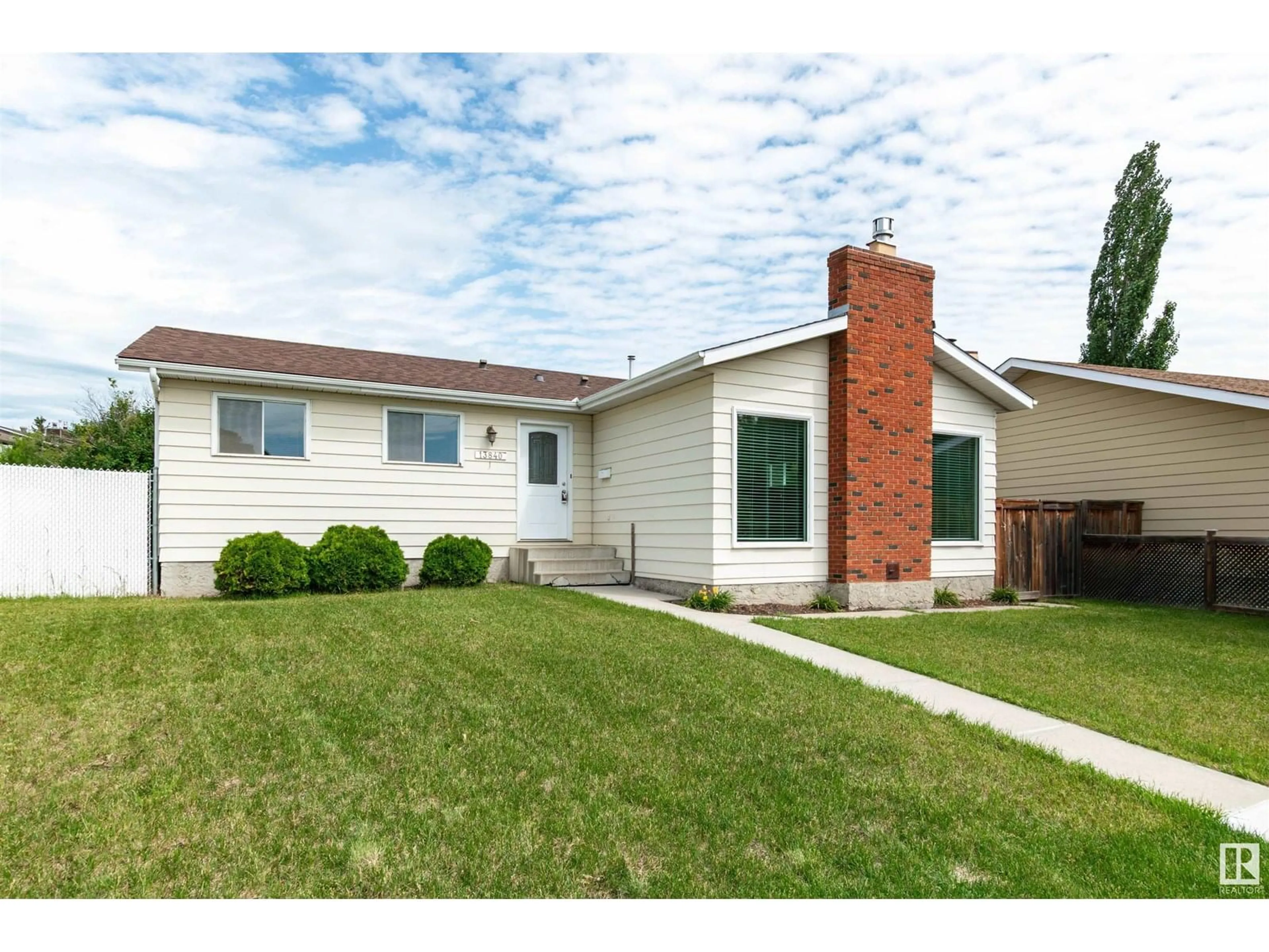 Home with vinyl exterior material, street for 13840 30 ST, Edmonton Alberta T5Y1M5