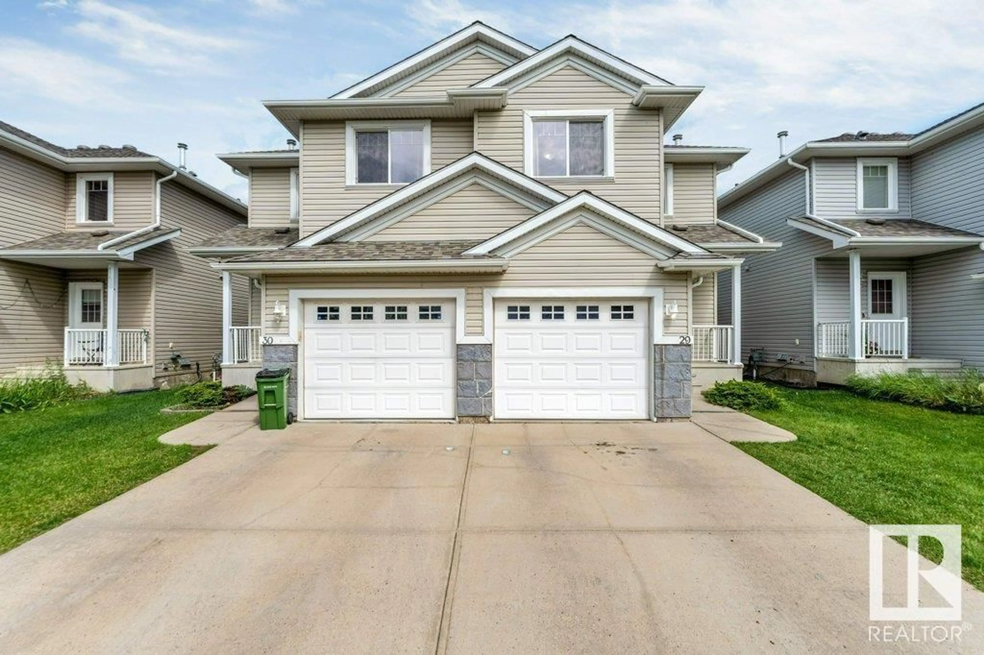 Home with vinyl exterior material, street for 29 - 2503 24 ST, Edmonton Alberta T6T0B5