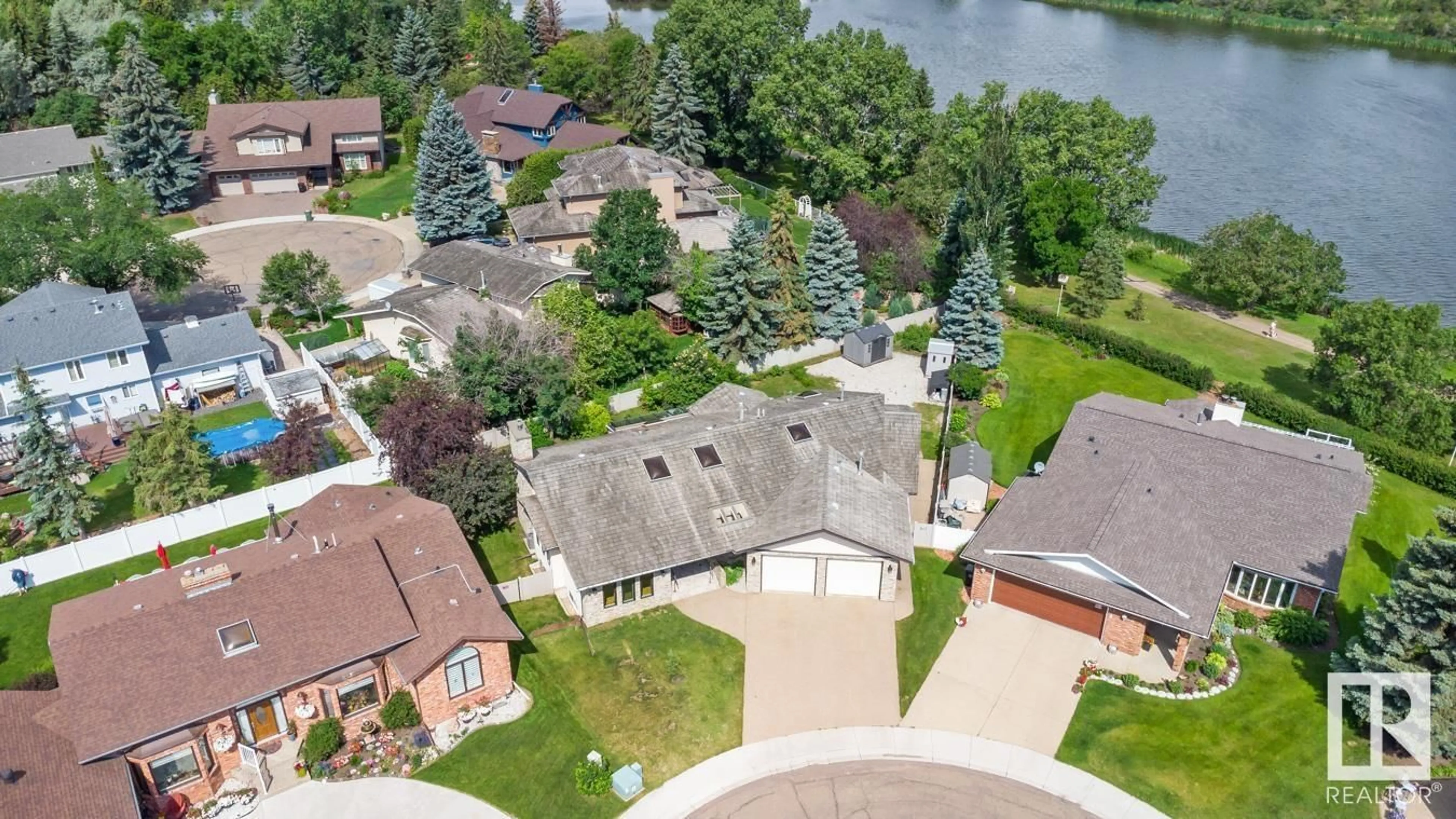 A pic from outside/outdoor area/front of a property/back of a property/a pic from drone, water/lake/river/ocean view for 6 CRESTVIEW PL, Leduc Alberta T9E5K9