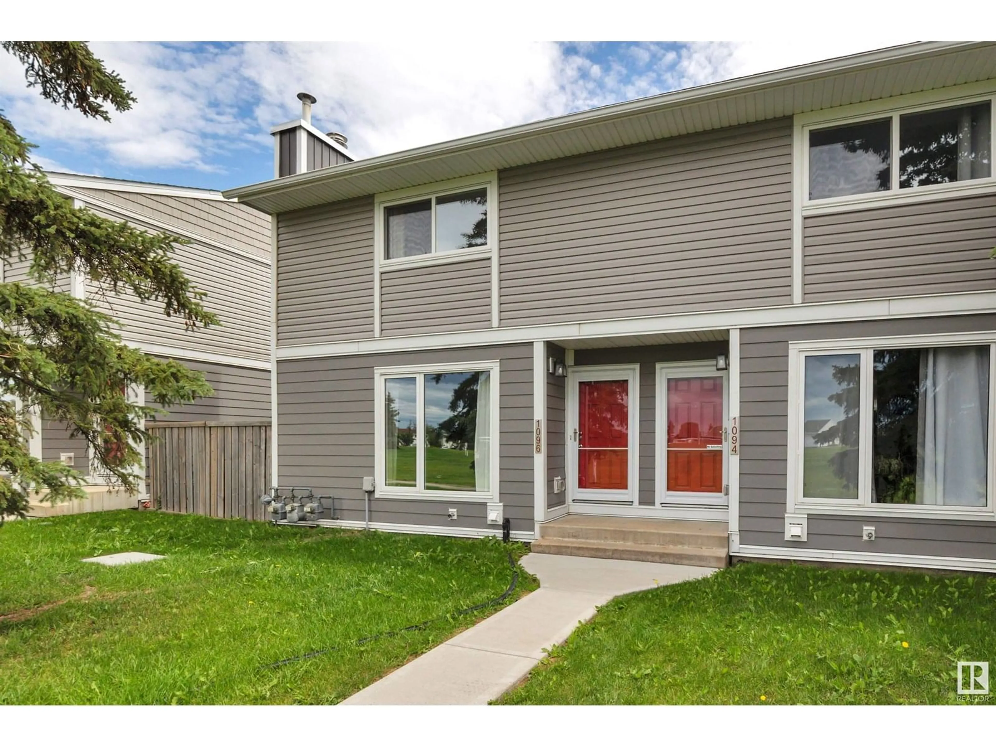 Home with vinyl exterior material, street for 1096 LAKEWOOD RD, Edmonton Alberta T6K3T7