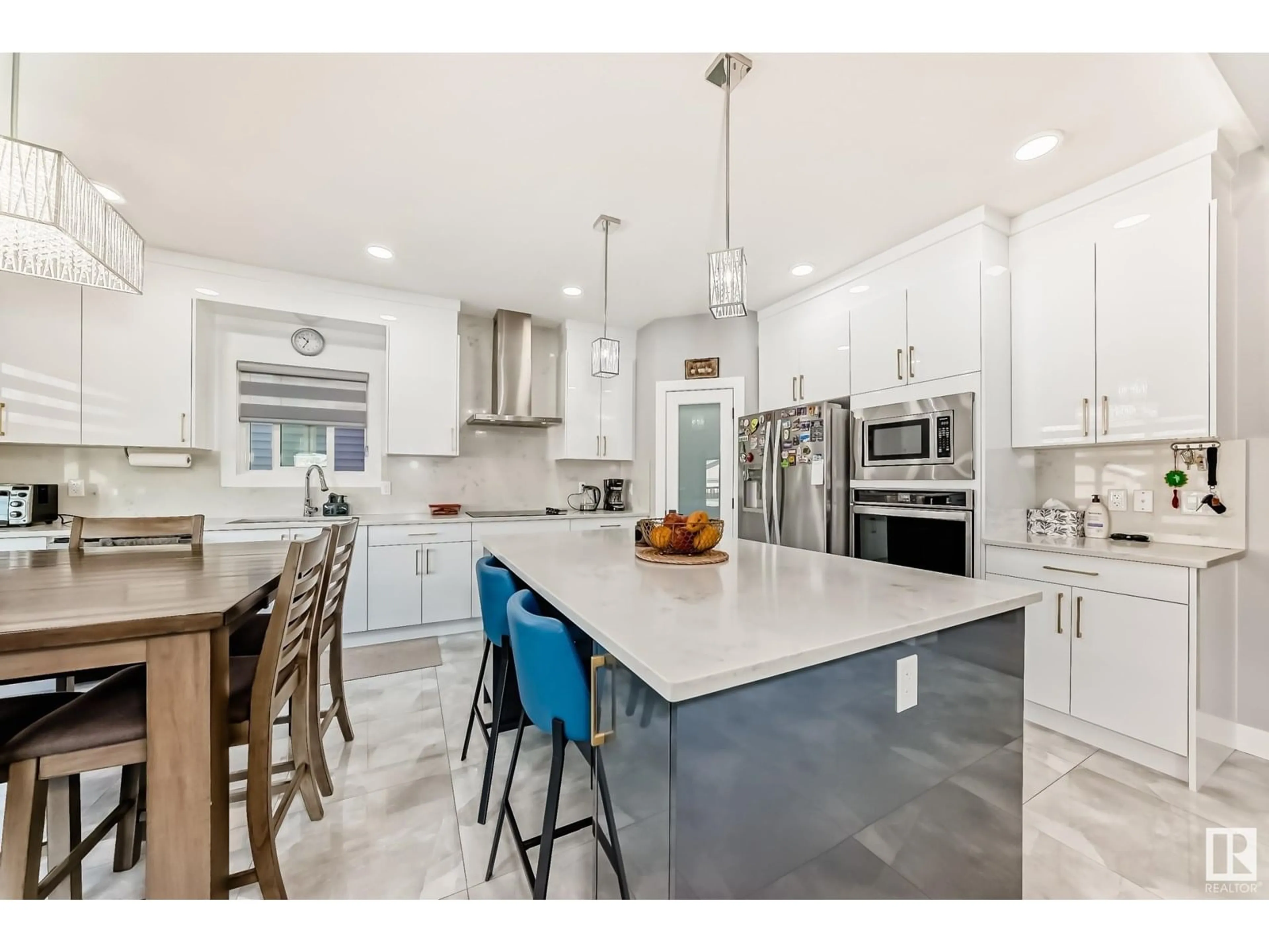 Open concept kitchen, ceramic/tile floor for 17920 59 ST, Edmonton Alberta T5Y3W8
