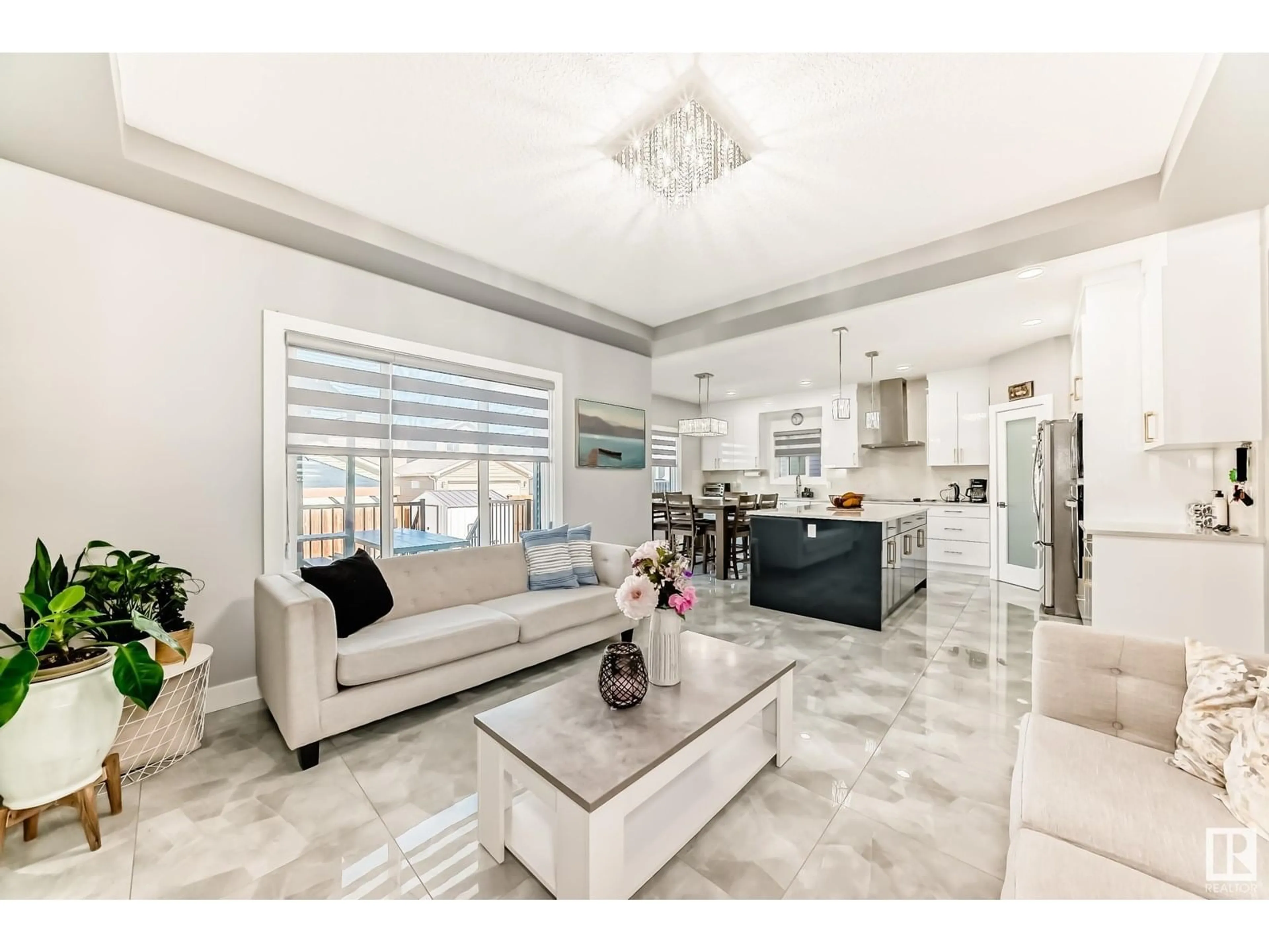 Living room with furniture, ceramic/tile floor for 17920 59 ST, Edmonton Alberta T5Y3W8