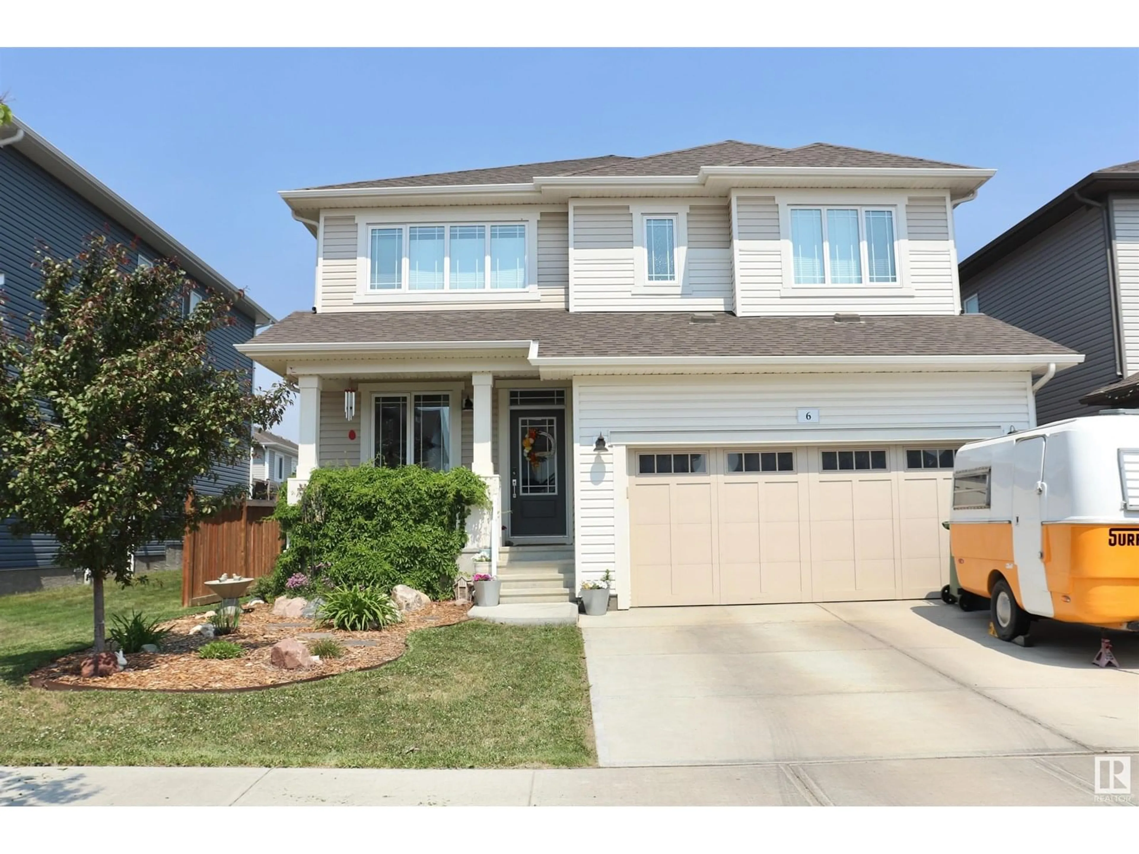 Home with vinyl exterior material, street for 6 PROMENADE PT, Beaumont Alberta T4X2C9