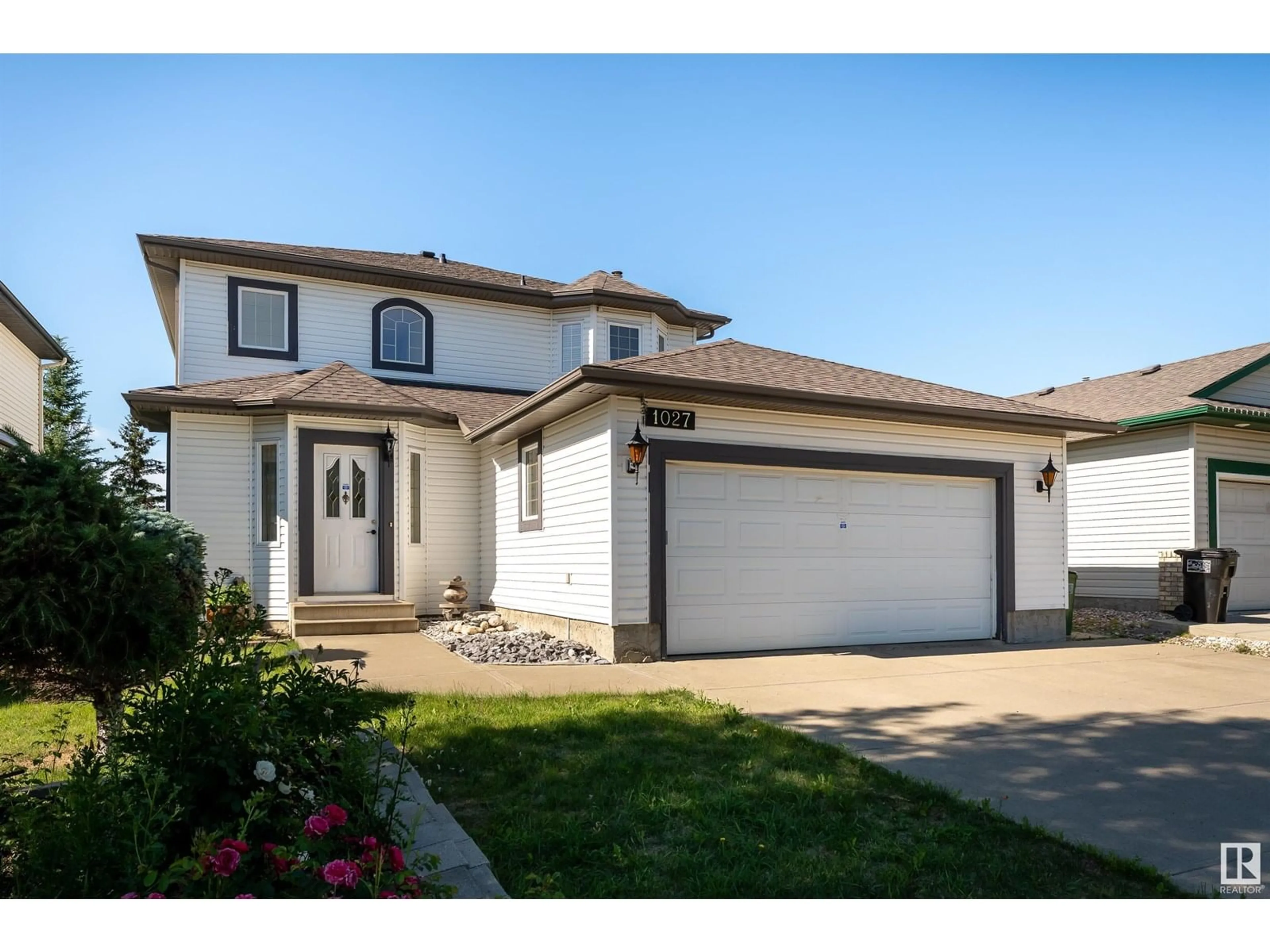 Home with vinyl exterior material, street for NW - 1027 GRAHAM CO, Edmonton Alberta T5T6L4