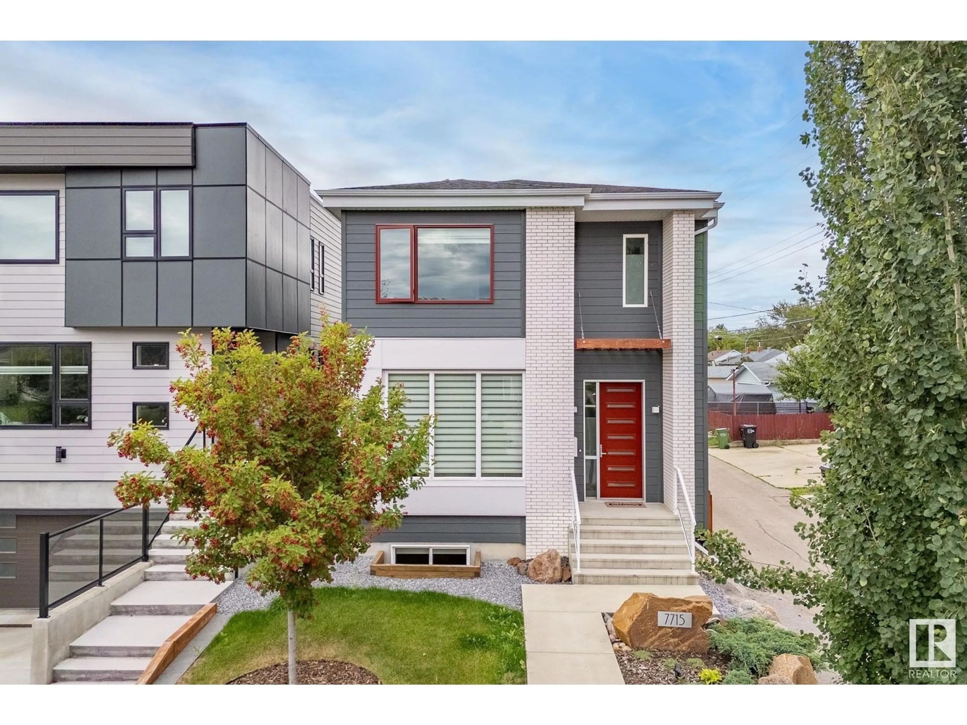 Home with vinyl exterior material, street for 7715 88 AV, Edmonton Alberta T6C1K7