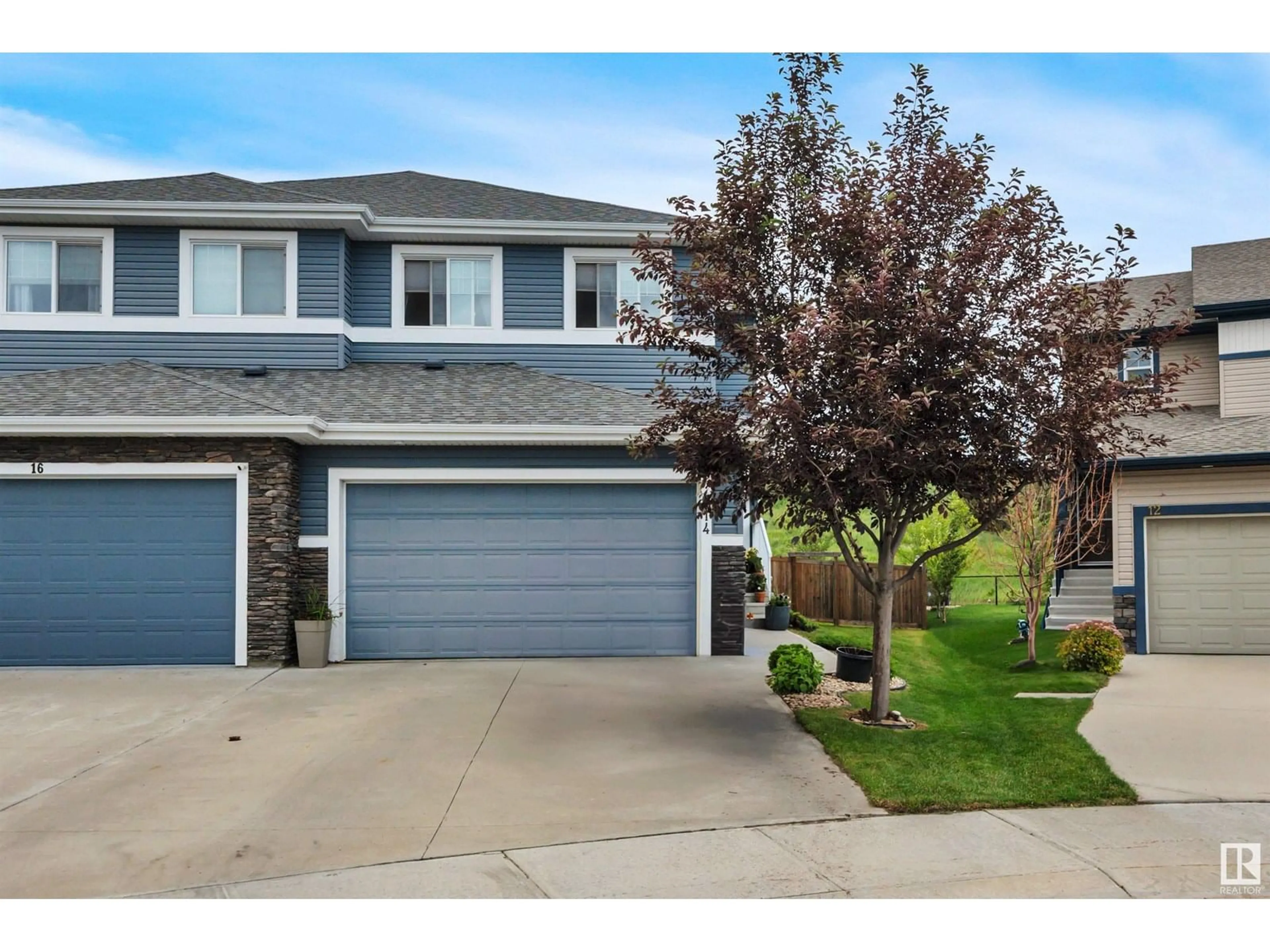 Home with vinyl exterior material, street for 14 ROLSTON CL, Leduc Alberta T9E1G6
