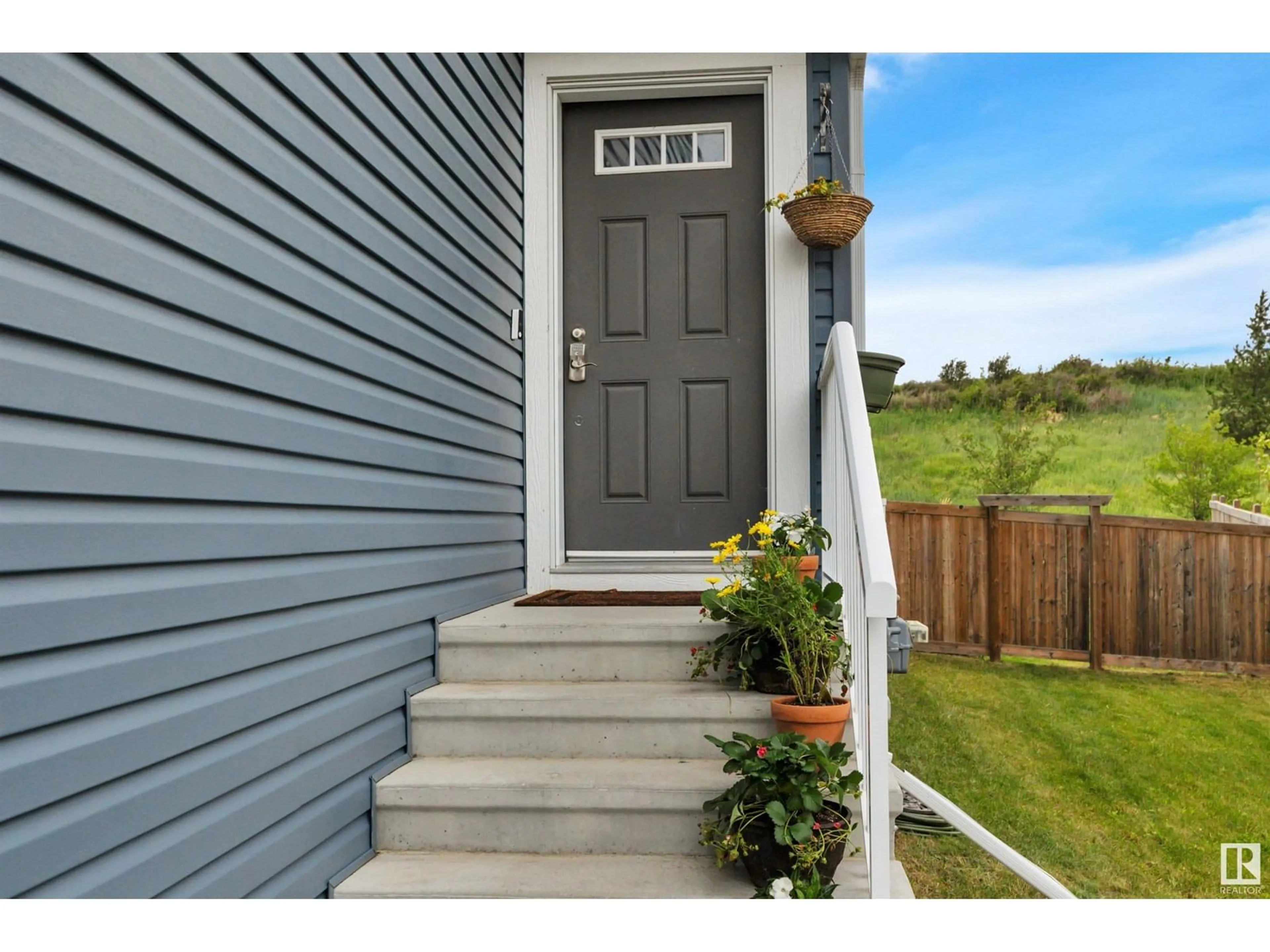 Home with vinyl exterior material, street for 14 ROLSTON CL, Leduc Alberta T9E1G6