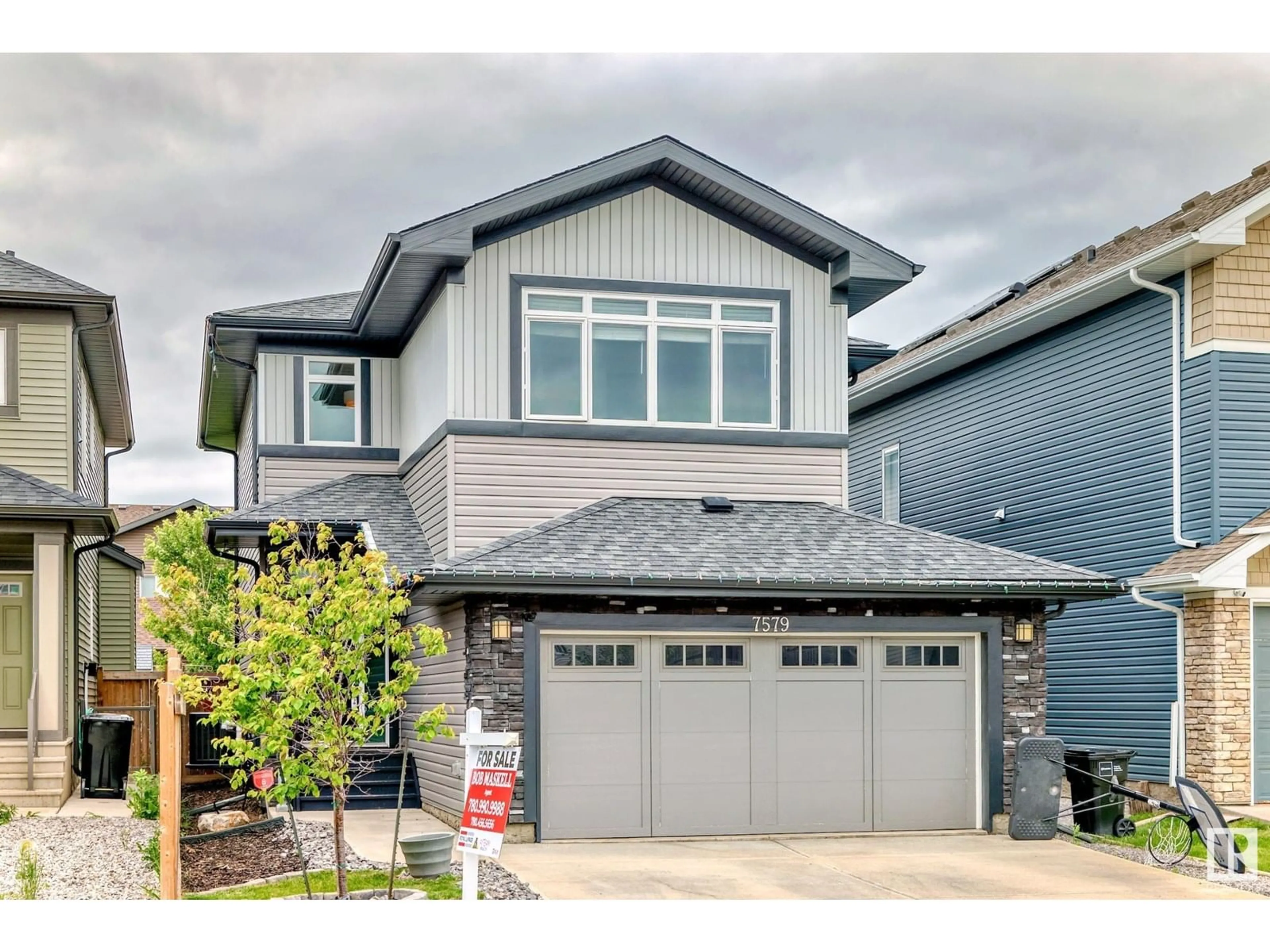 Home with vinyl exterior material, street for 7579 176 AV, Edmonton Alberta T5Z0Z3