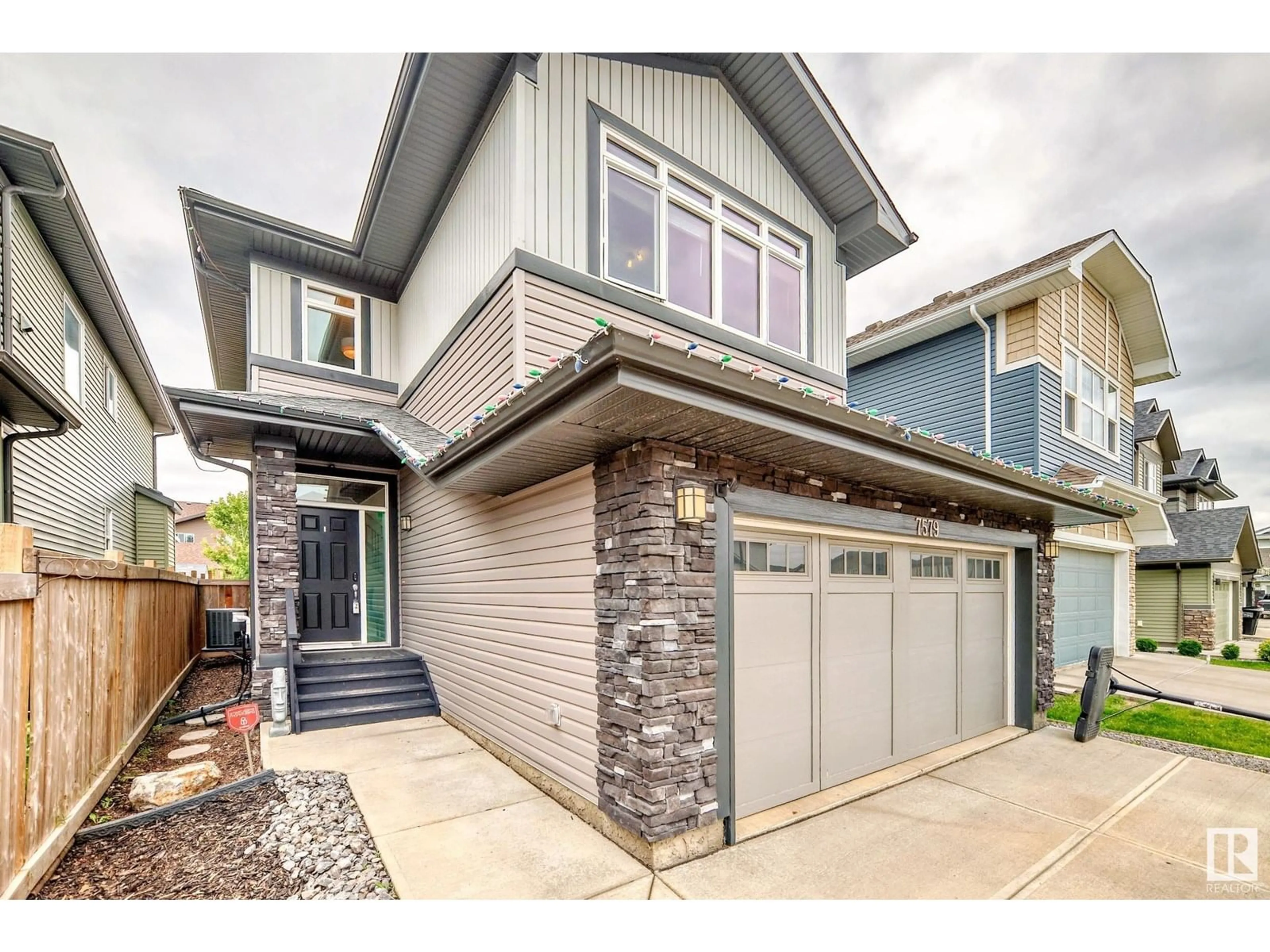 Home with vinyl exterior material, street for 7579 176 AV, Edmonton Alberta T5Z0Z3