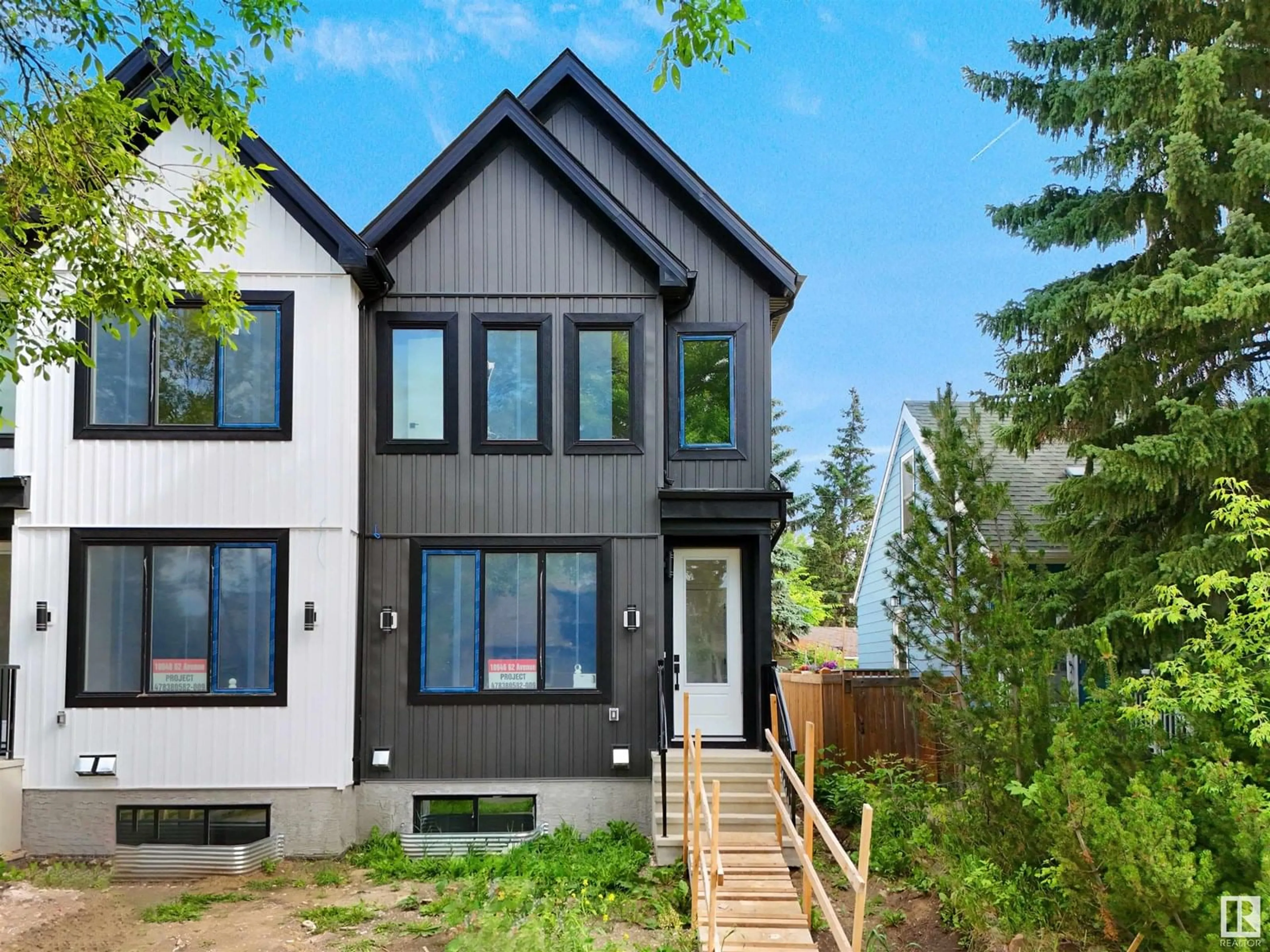 Home with vinyl exterior material, street for 10946 62 AV, Edmonton Alberta T6H1N2