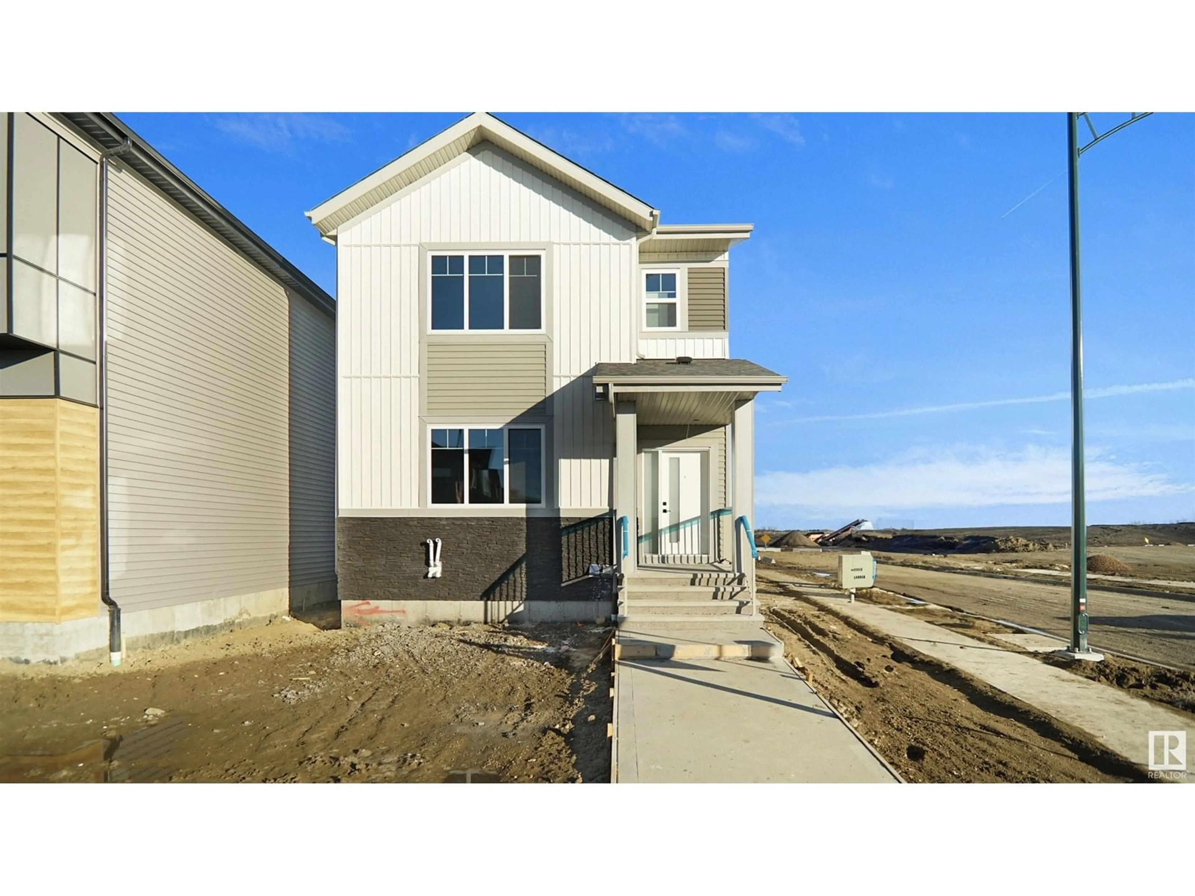 Home with vinyl exterior material, water/lake/river/ocean view for 703 MATTSON DR, Edmonton Alberta T6X3G3
